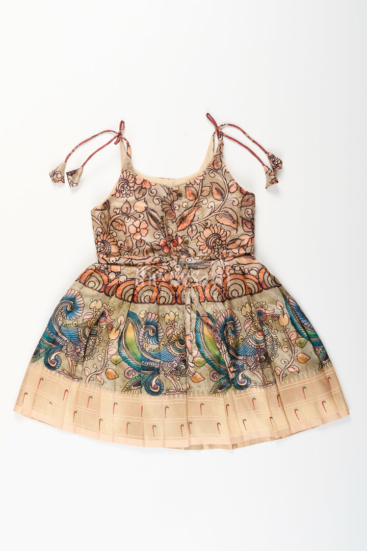Silk blend Kalamkari tie-up frock for baby girls with peacock border