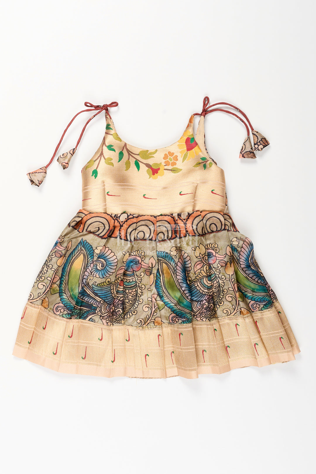 Silk blend Kalamkari tie-up frock for baby girls with peacock border
