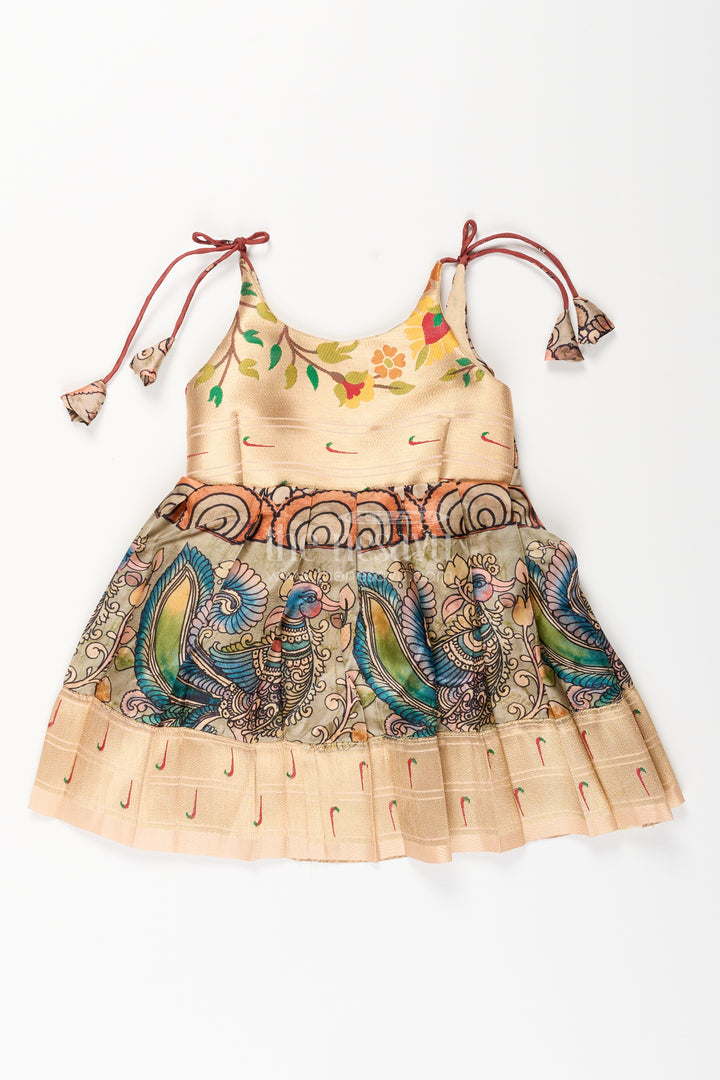 Silk blend Kalamkari tie-up frock for baby girls with peacock border