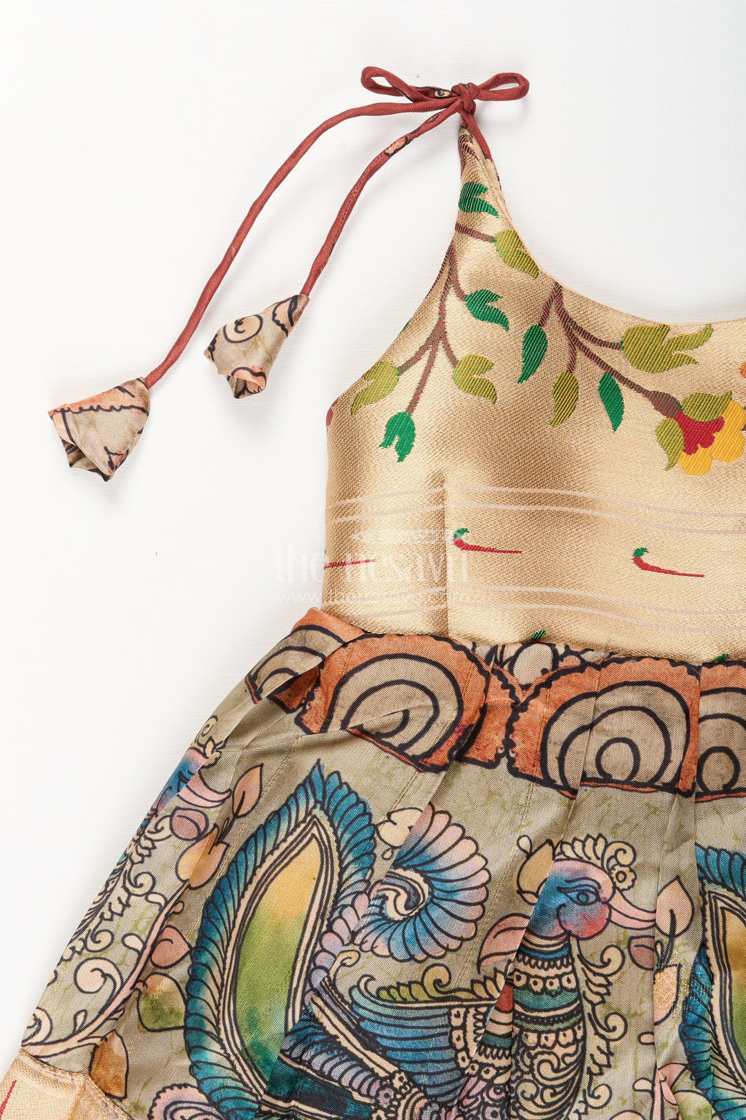 Silk blend Kalamkari tie-up frock for baby girls with peacock border
