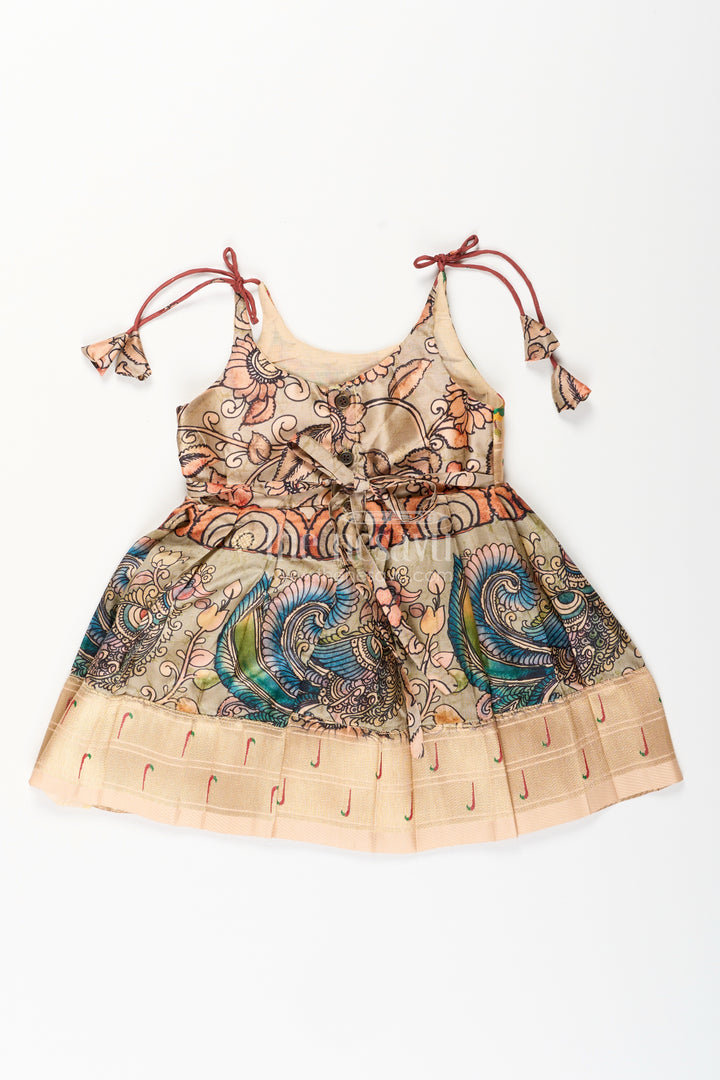 Silk blend Kalamkari tie-up frock for baby girls with peacock border