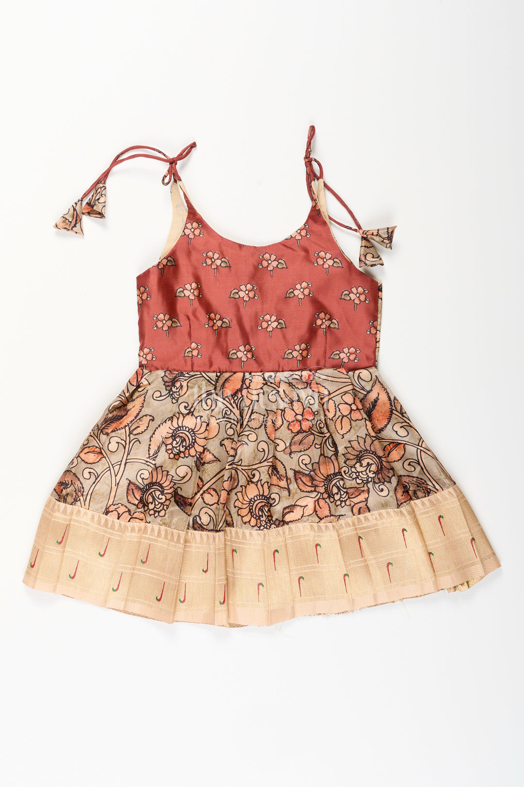 Silk blend Kalamkari tie-up frock for baby girls with peacock border