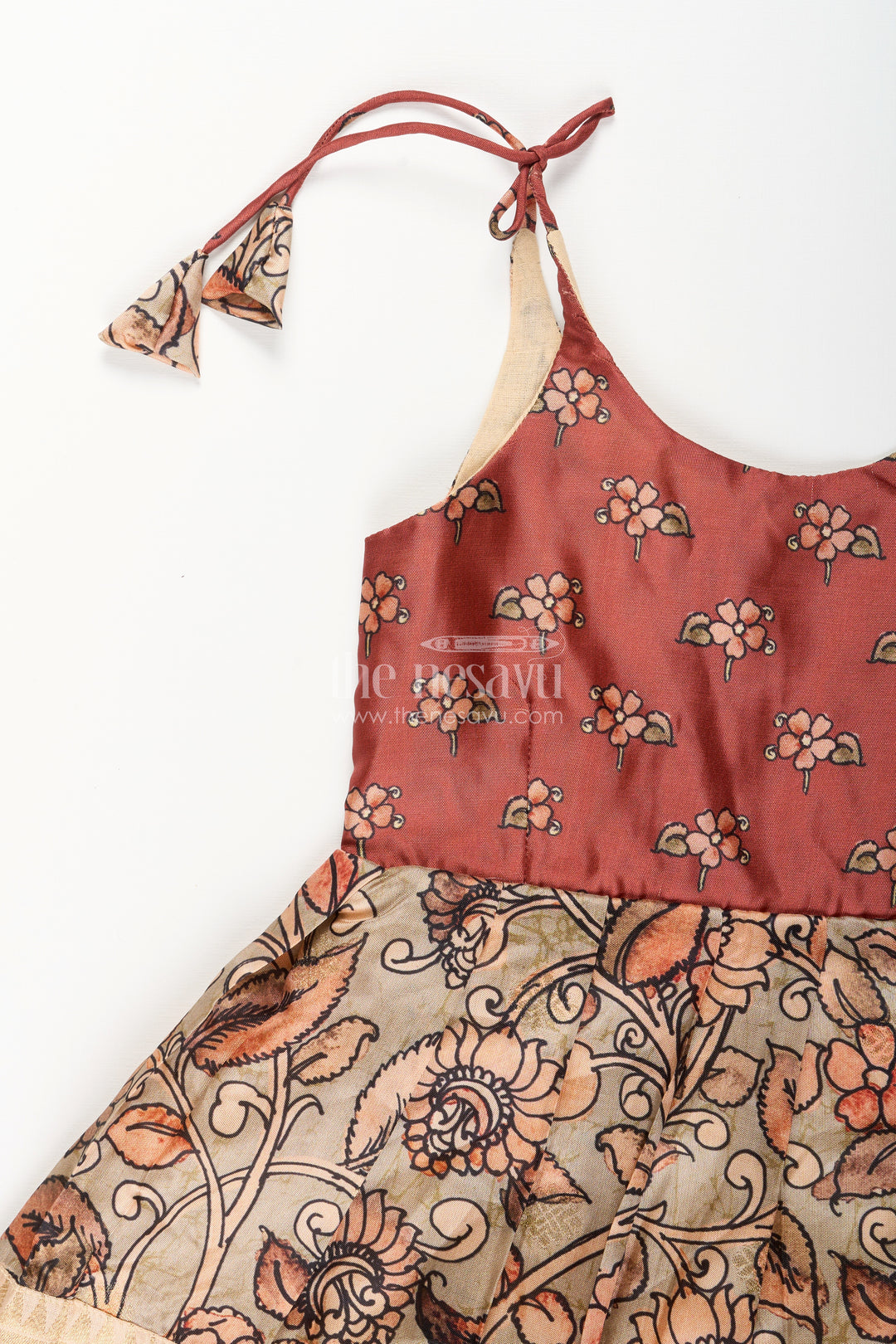 Silk blend Kalamkari tie-up frock for baby girls with peacock border