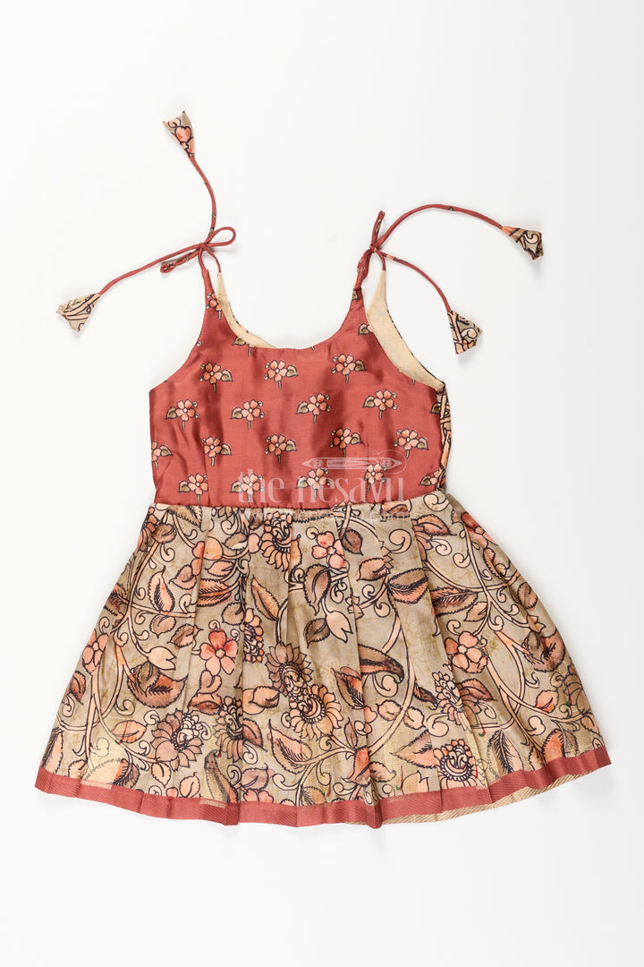 Silk blend Kalamkari tie-up frock for baby girls with peacock border