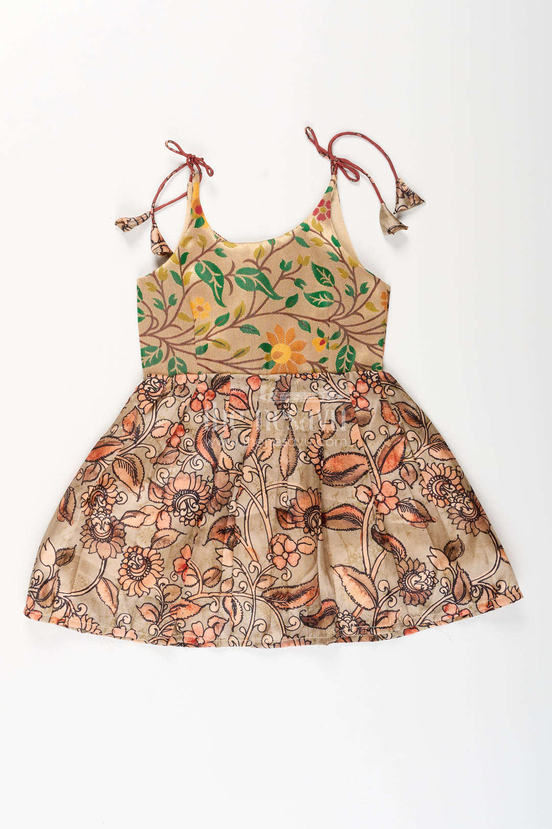 Silk blend Kalamkari tie-up frock for baby girls with peacock border