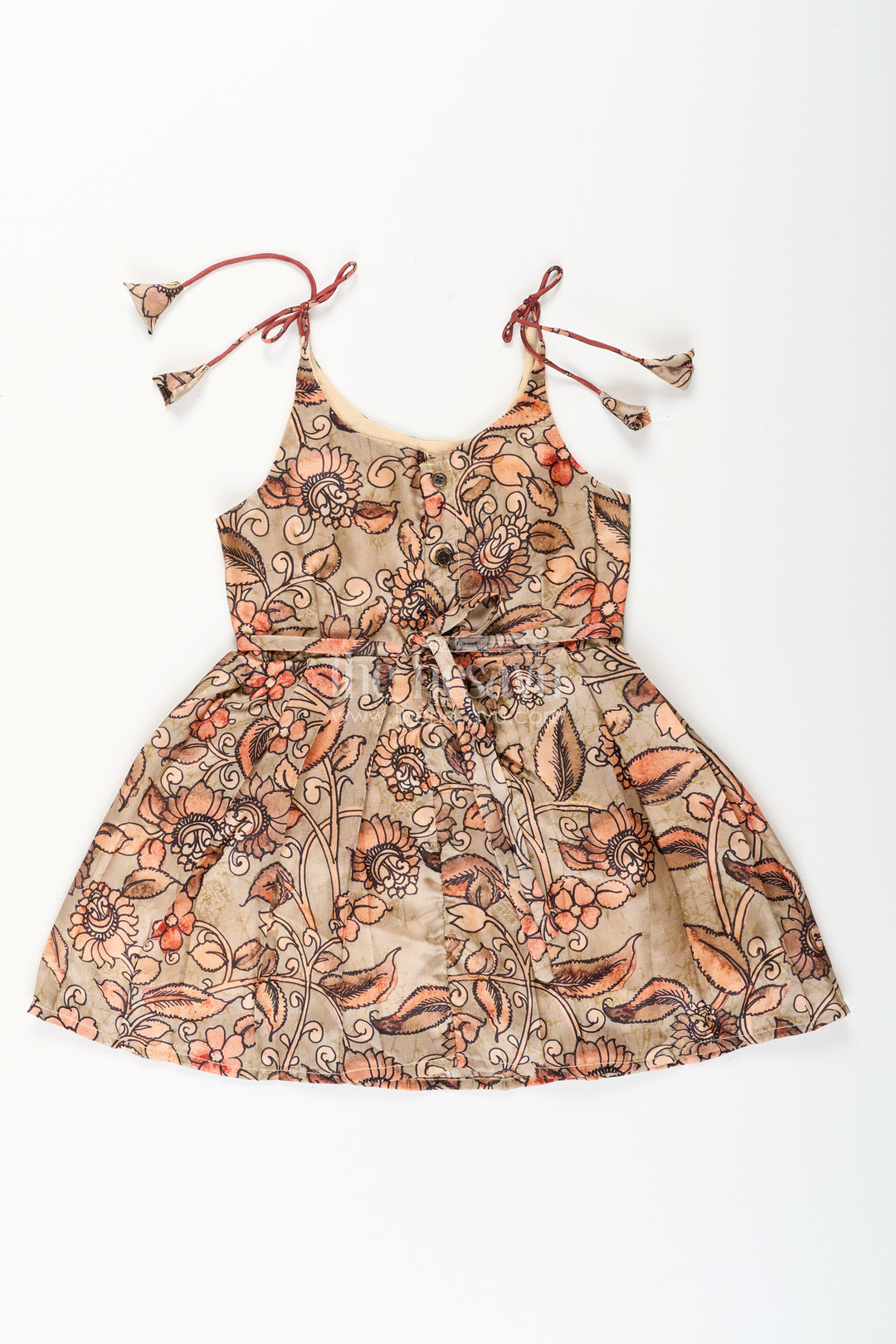 Silk blend Kalamkari tie-up frock for baby girls with peacock border