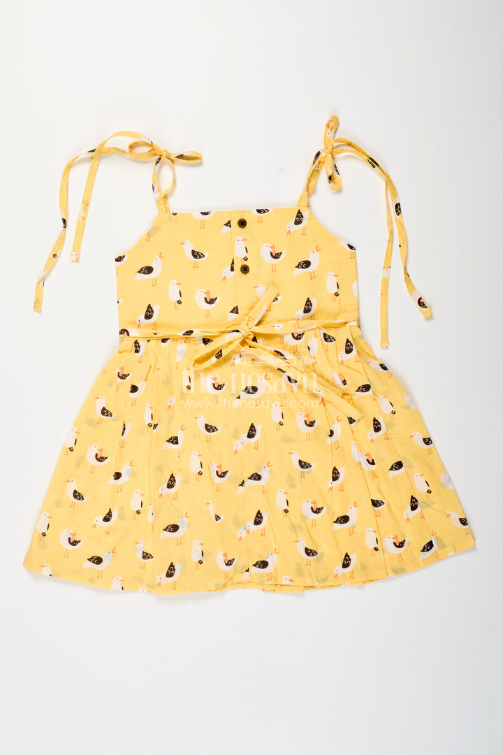 Yellow tie-up cotton frock for toddler girls with playful bird print