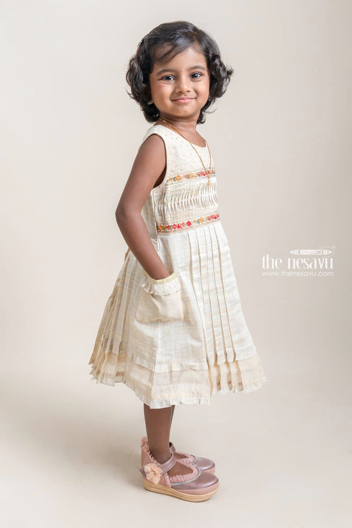The Nesavu Girls Cotton Frock Adorable Beige Floral Embroidered Sleeveless And Pleated Cotton Frock For Girls Nesavu Trendy Floral Printed Frock for Girls | New Cotton Collection | The Nesavu