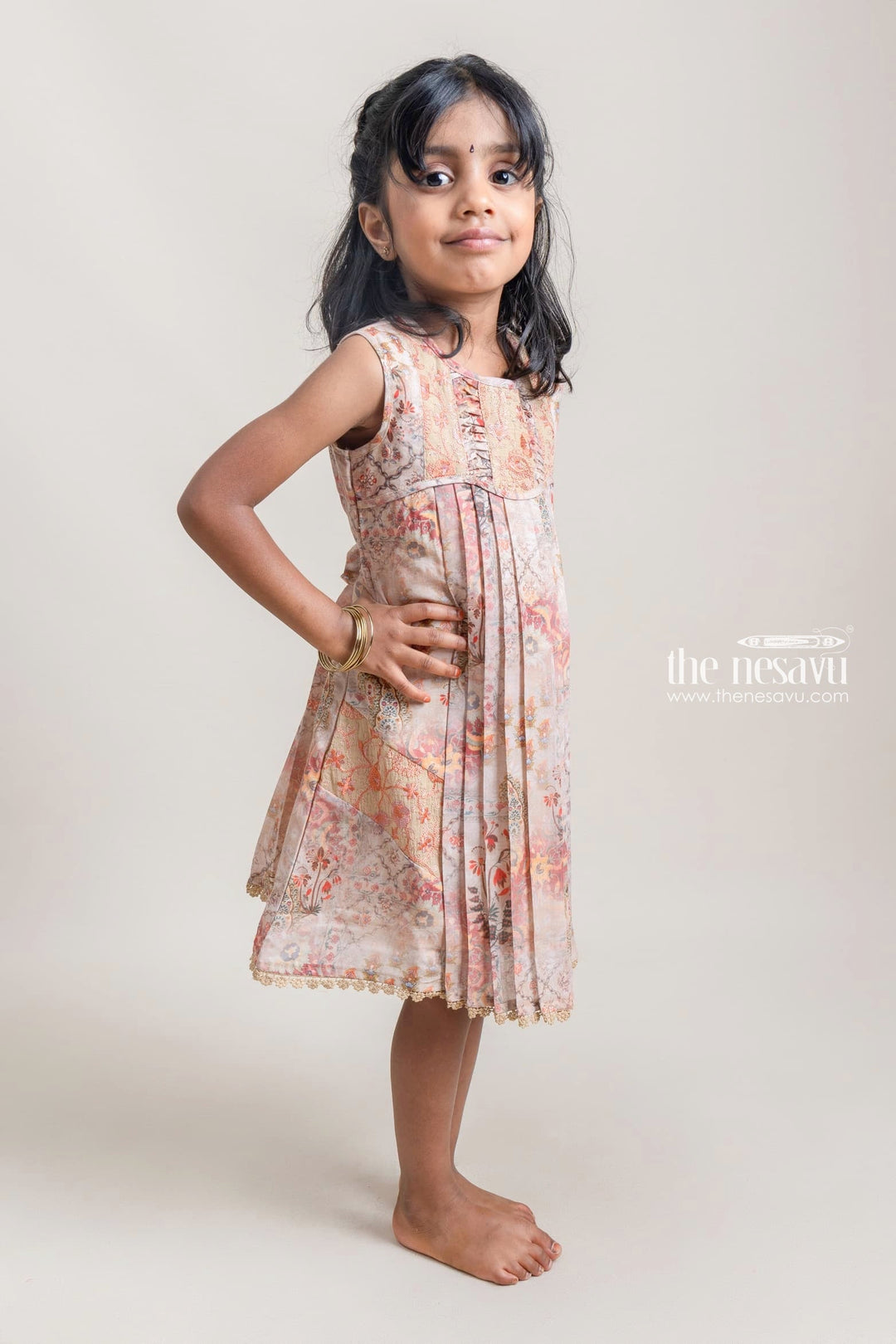 The Nesavu Girls Cotton Frock Adorable Beige Paisley Printed Pleated Cotton Frock For Girls Nesavu Fantastic Floral Printed Cotton Frock For Girls | Premium Cotton Frocks | The Nesavu