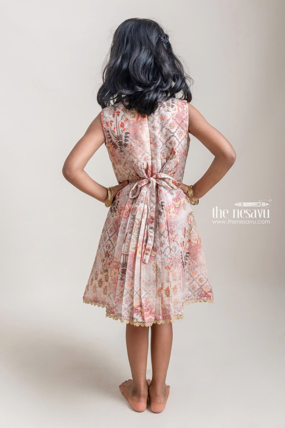The Nesavu Girls Cotton Frock Adorable Beige Paisley Printed Pleated Cotton Frock For Girls Nesavu Fantastic Floral Printed Cotton Frock For Girls | Premium Cotton Frocks | The Nesavu