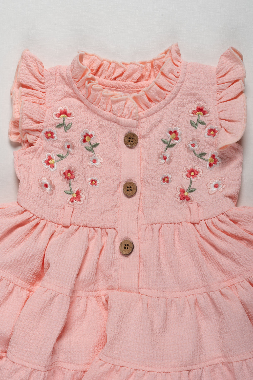The Nesavu Girls Cotton Frock Adorable Girls Pink Cotton Ruffle Frock with Floral Embroidery Nesavu Adorable Girls Pink Cotton Ruffle Frock with Floral Embroidery | The Nesavu