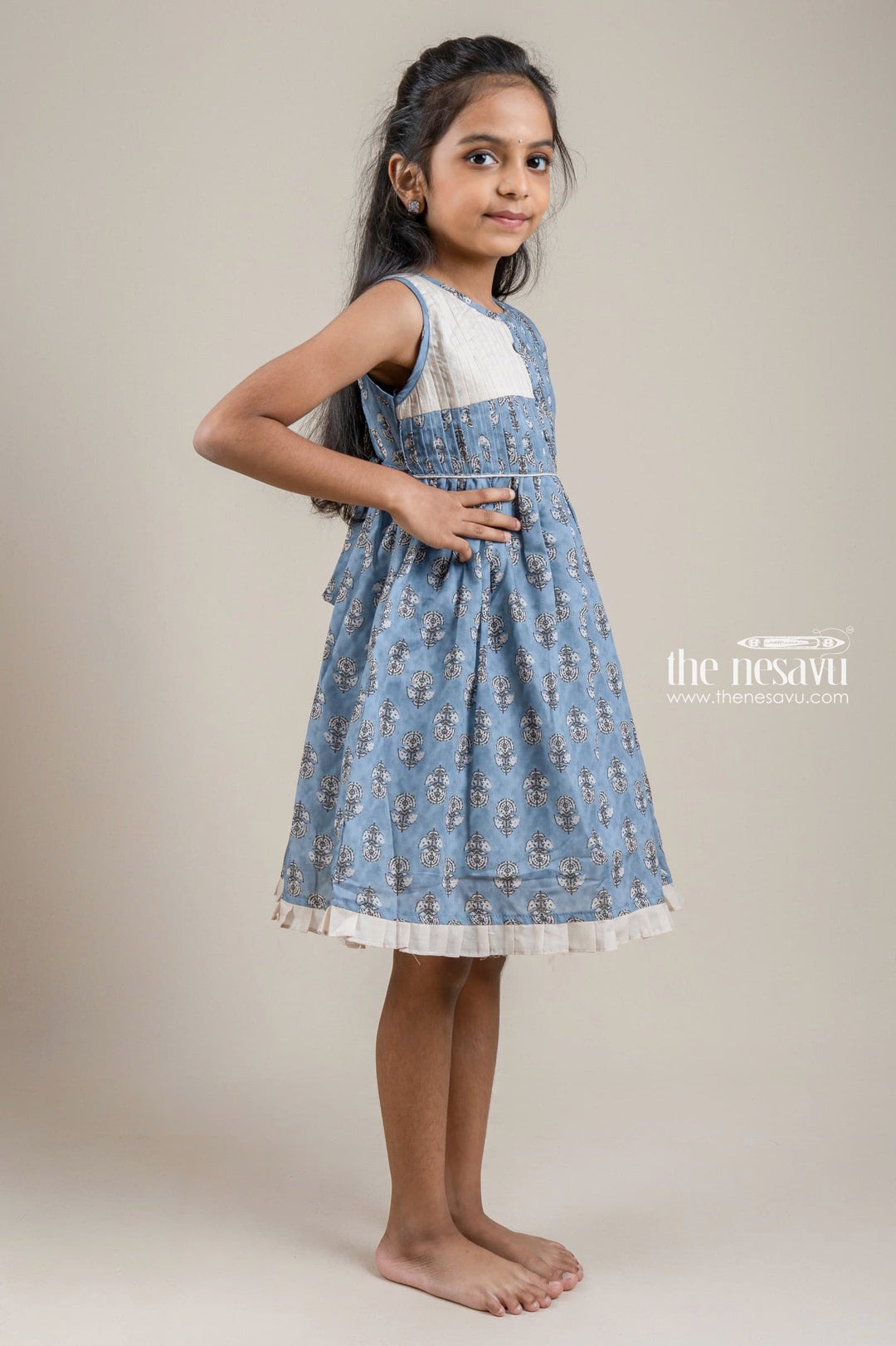 The Nesavu Girls Fancy Frock Adorable Hand Block Printed Sleeveless Blue Cotton Frock with Embellished Potli Button for Girls Nesavu Hand Block Printed Cotton Frock | Latest Cotton Frock | The Nesavu