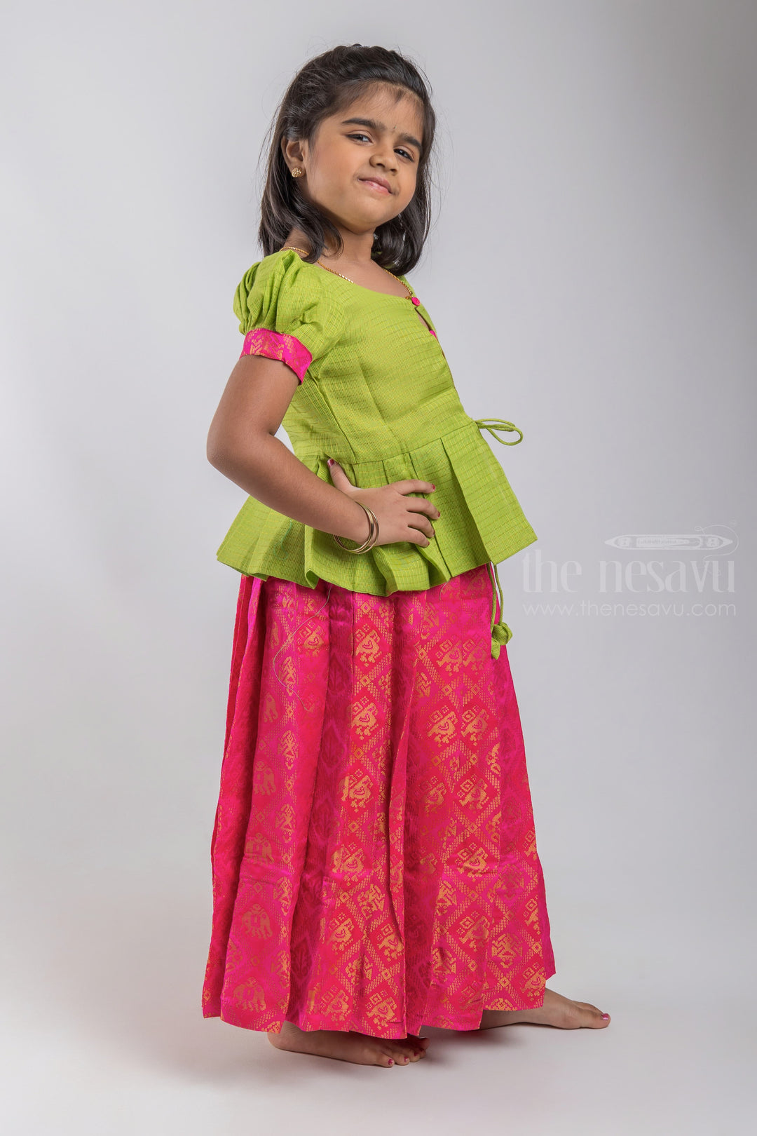 The Nesavu Pattu Pavadai Adorable Parrot Green Silk Blouse And Pink Pleated Designer Silk Skirt For Girls psr silks Nesavu