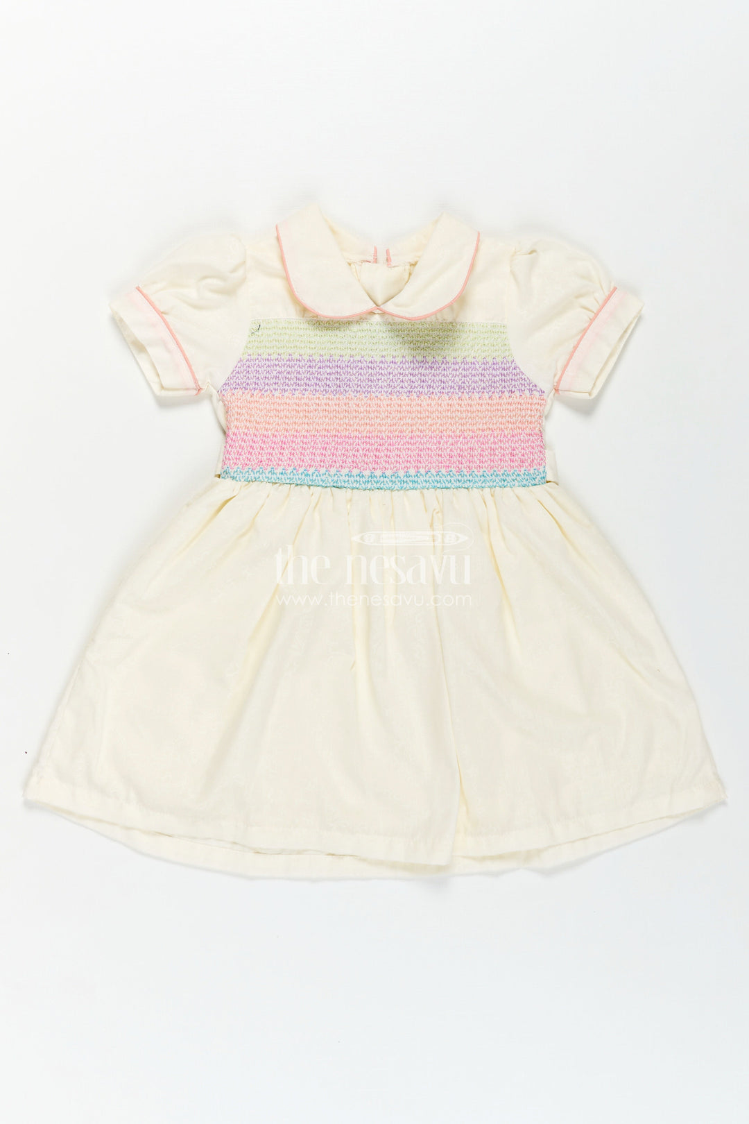 The Nesavu Girls Cotton Frock Archive -Girls Short Frock White Colour with Smocked Rainbow Yoke and Peter Pan Collar in Soft Cotton Blend Nesavu Nesavu Girls Short Frock White Colour Rainbow Smocked Yoke Peter Pan Collar