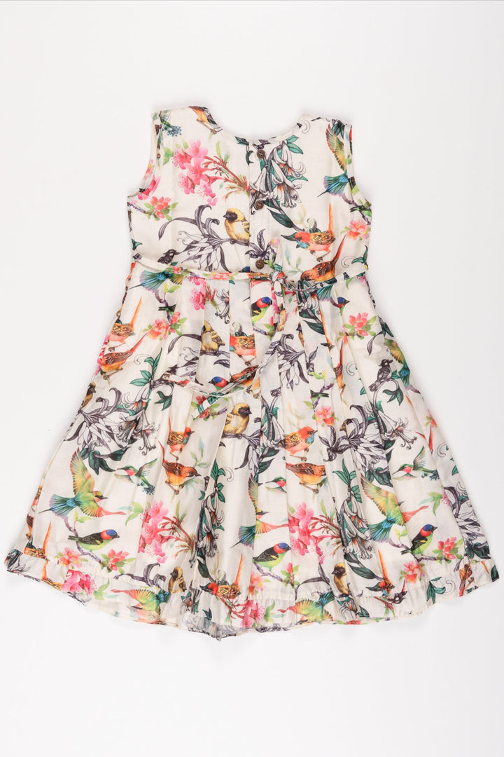 The Nesavu Girls Cotton Frock Aviary Elegance Summer Dress: Girls' Sleeveless Frock with Vivid Bird Print Nesavu Girls White Tropical Bird Print Dress | Sleeveless Lace Trim Frock | Summer Party Outfit | The Nesavu