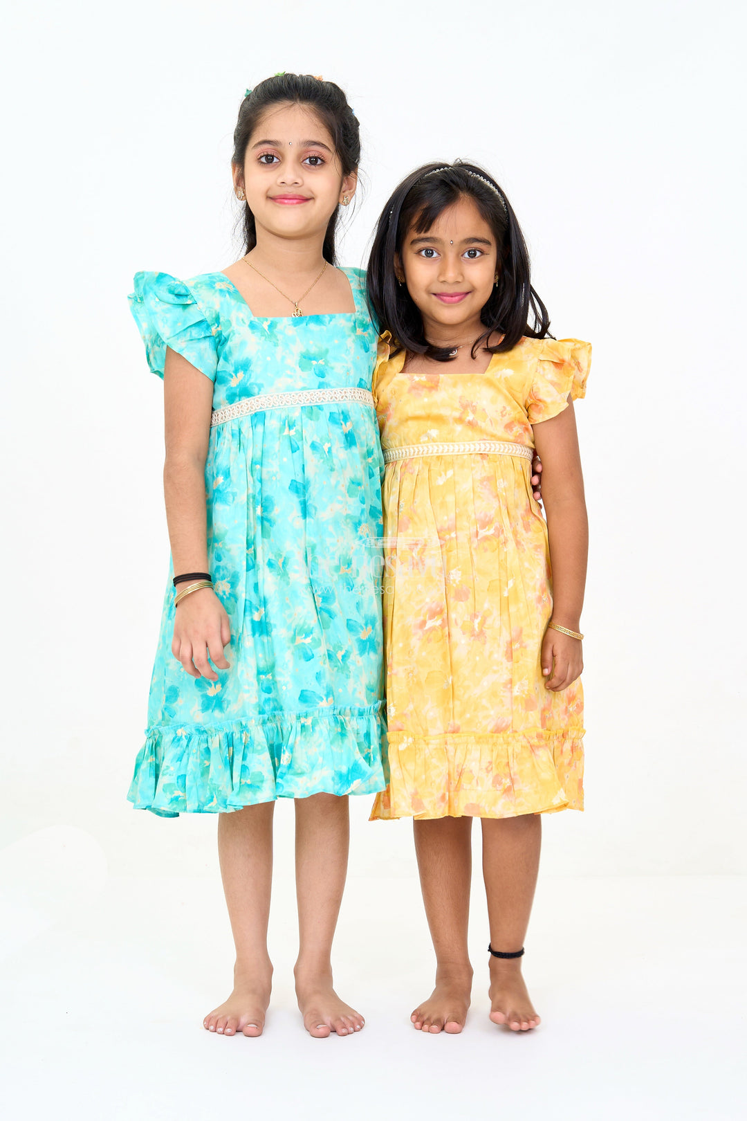 The Nesavu Girls Cotton Frock Baby Cotton Hug Clothing with Blue Floral Prints and Ruffled Design Nesavu Nesavu Baby Cotton Hug Clothing Floral Prints Ruffled Hem Blue