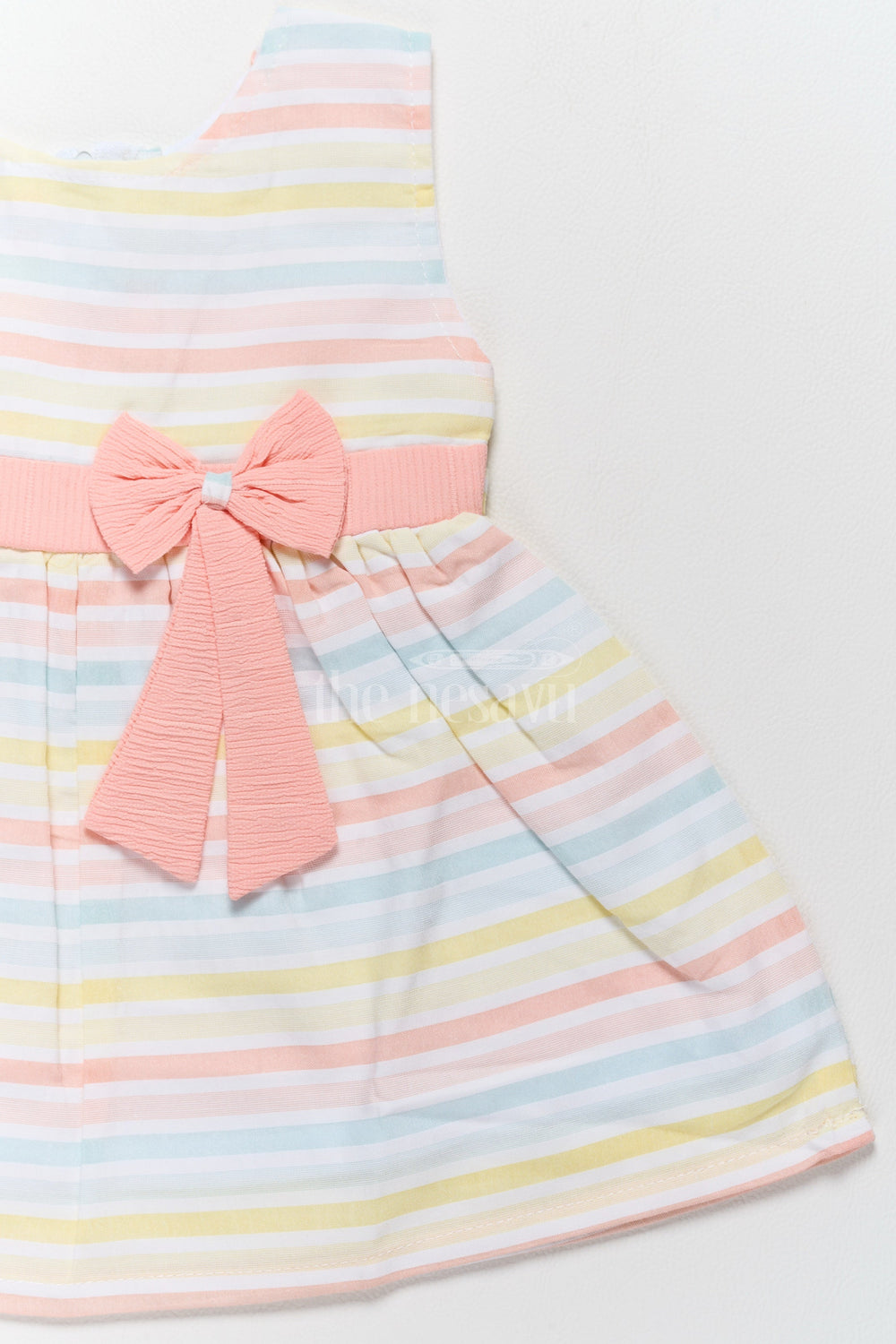 The Nesavu Baby Cotton Frocks Baby Cotton Short Dress with Pastel Stripes and Peach Bow Accent Nesavu Nesavu Baby Cotton Short Dress Multicolor Stripes Peach Bow Accent