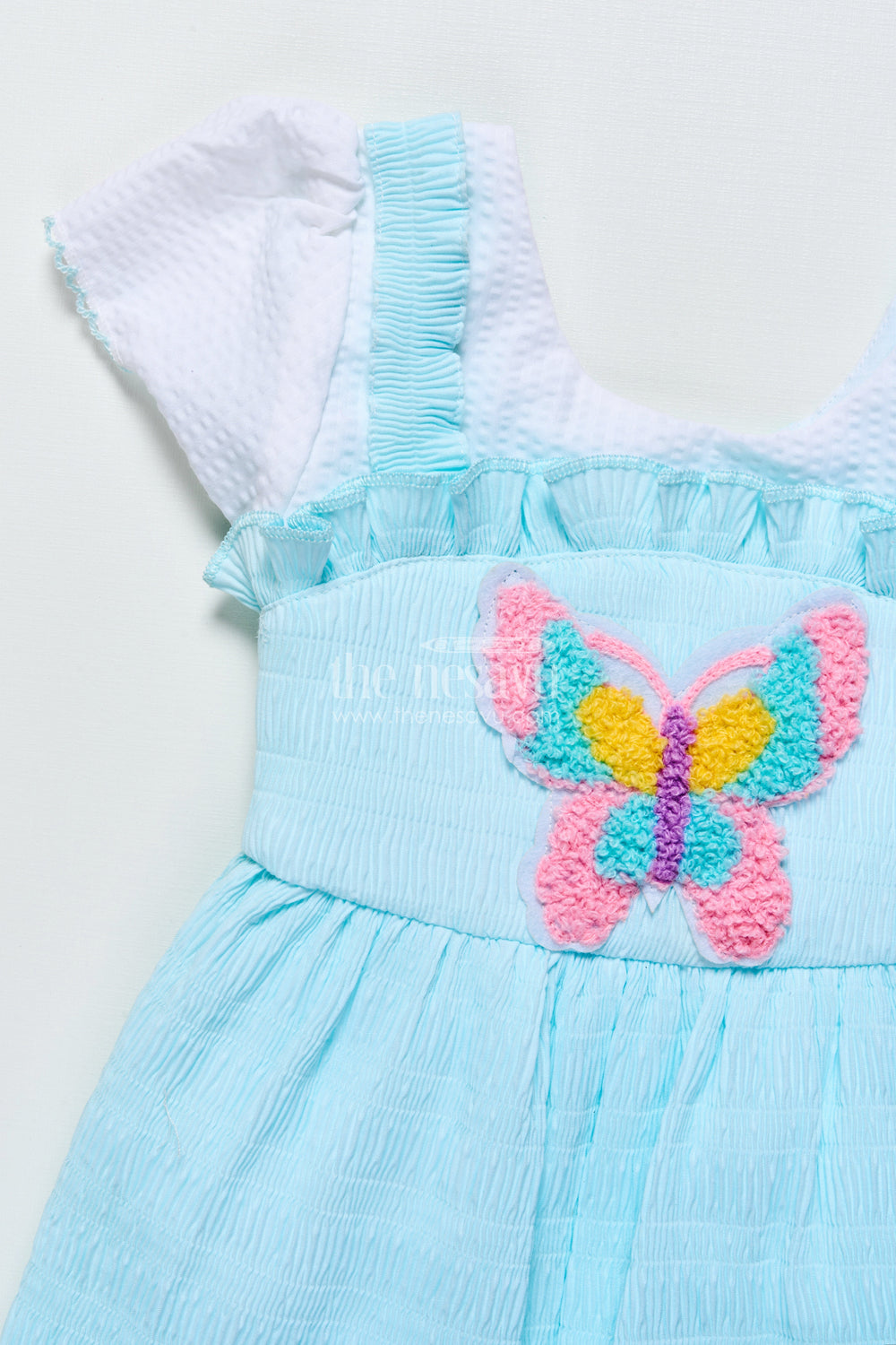 The Nesavu Baby Frocks Baby Frock in Seersucker Cotton with Multicolor Butterfly Patch Pink Nesavu Nesavu baby pink butterfly frock in seersucker cotton for girls