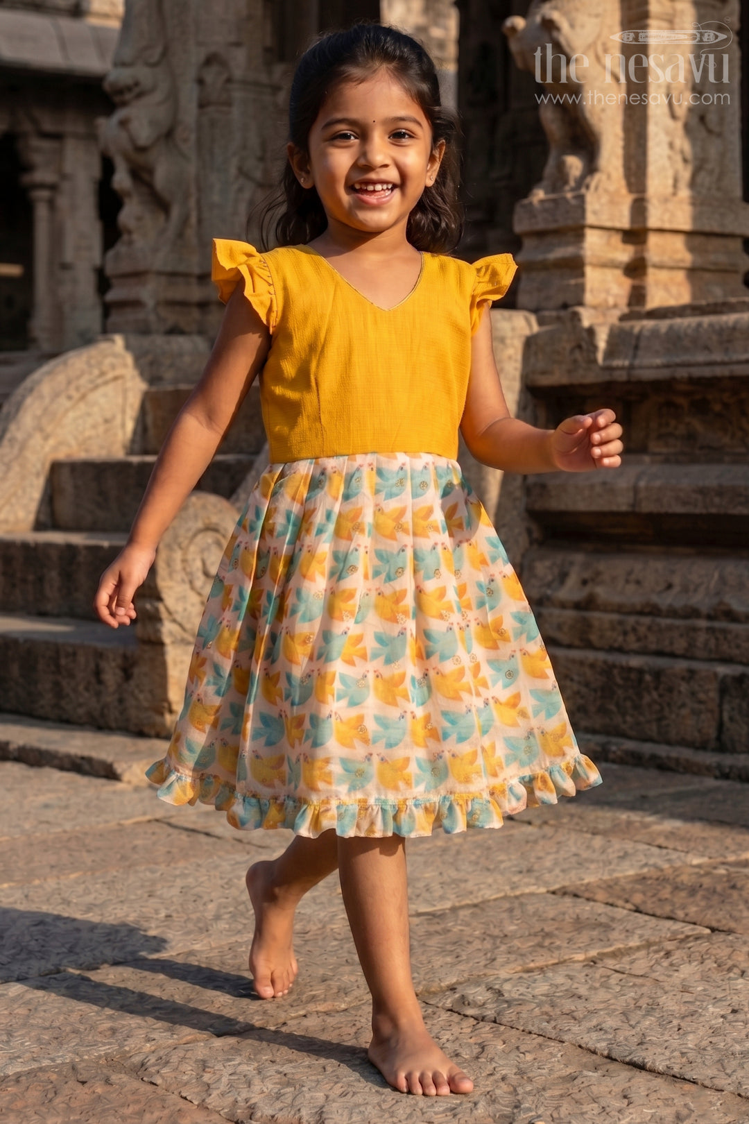 The Nesavu Silk Frock Baby Girl Chanderi Silk Frock with Bird Print for Birthdays and Day Outings Nesavu 18 (2Y) / Yellow / Cotton Silk SF1129A-18 Nesavu baby girl chanderi cotton silk frock with bird print and ruffle sleeves for festive outings