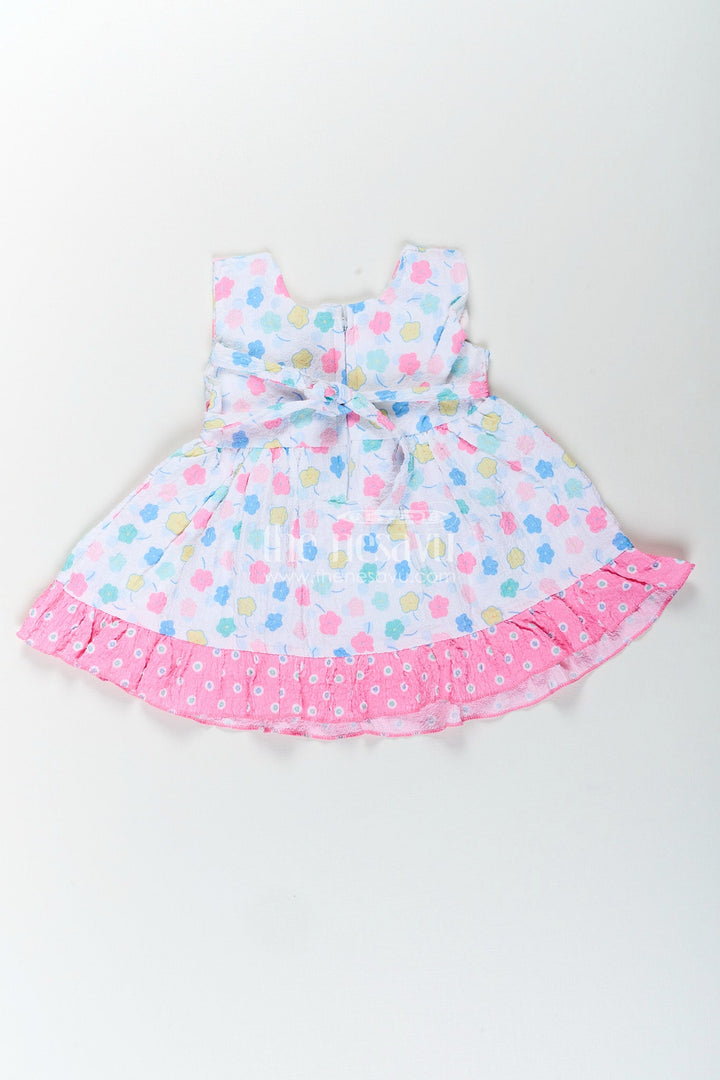 The Nesavu Baby Cotton Frocks Baby girl cotton frock with bow and floral print for casual summer days Nesavu Nesavu baby girl cotton frock pink bow floral print  perfect summer playdates daily wear