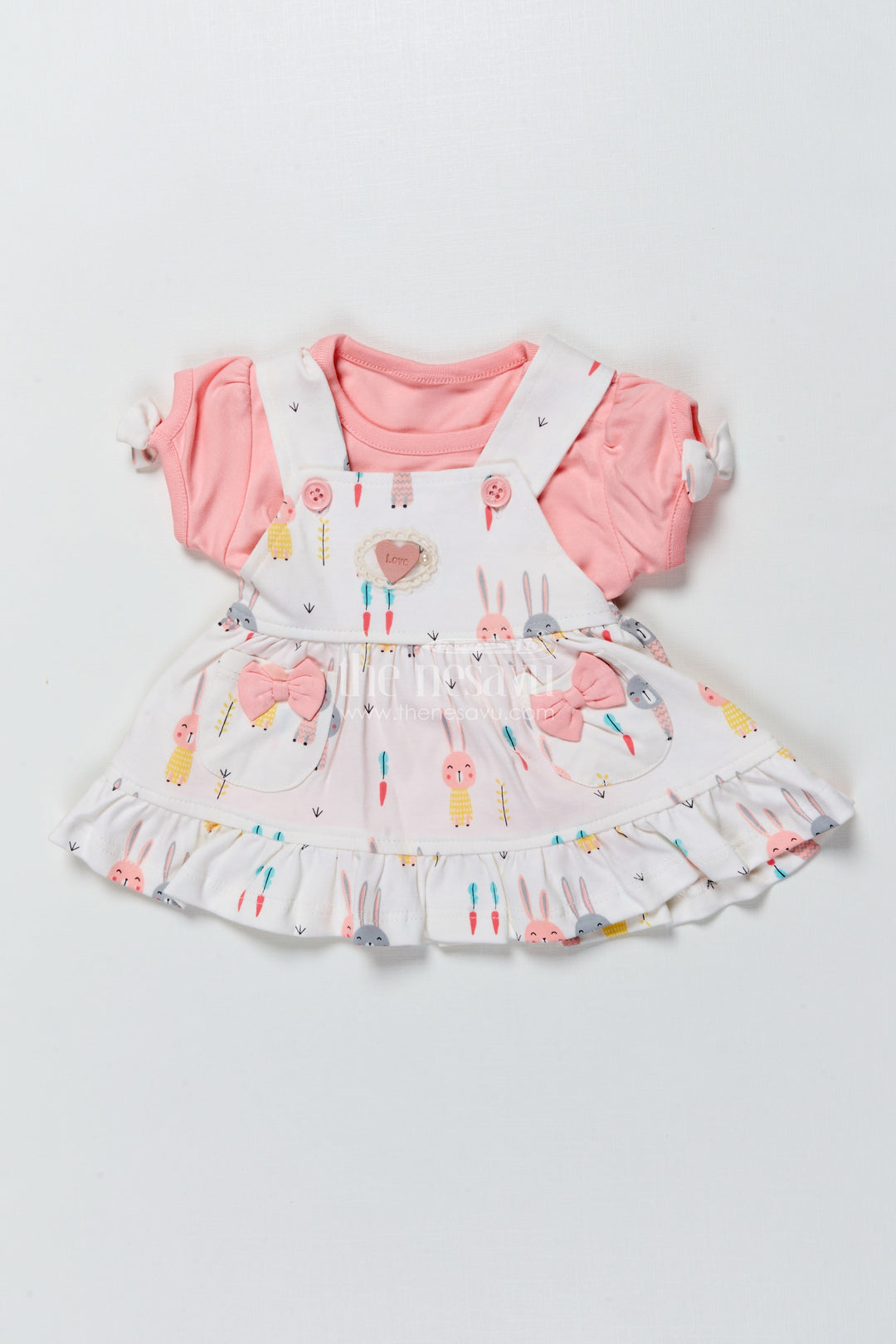 The Nesavu Baby Frocks Baby Girl Frock with Bunny Print and Bows for Playful Everyday Wear Nesavu 10 (NB) / Peach BFJ878A-10 Nesavu baby girl frock bunny print bows  perfect playdates everyday comfort