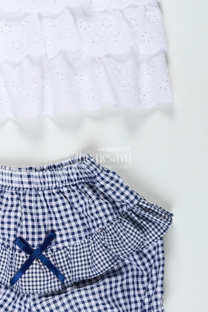The Nesavu Baby Frocks Baby girl frock with navy gingham shorts and bow detailing Nesavu Nesavu white hakoba baby frock with navy checked bloomers