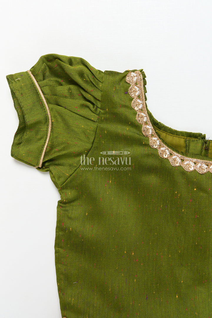 The Nesavu Pattu Pavadai Baby Girl Green Pattu Pavadai with Lace Detailing and Floral Print Skirt Nesavu Nesavu baby girl pattu pavadai green floral print skirt festivals poojas
