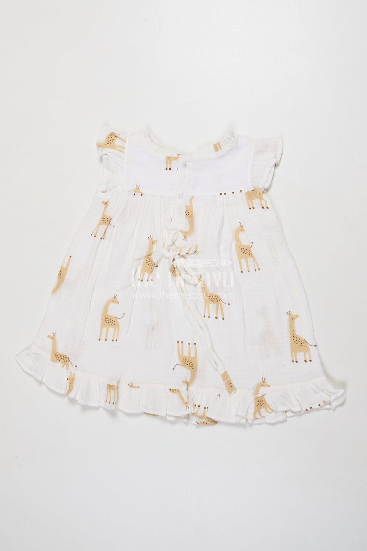 The Nesavu Girls Cotton Frock Baby Girl Muslin Cotton Frock with Giraffe Print for Casual Outings and Playdates Nesavu Nesavu baby girl muslin cotton frock with giraffe print for everyday wear and outings