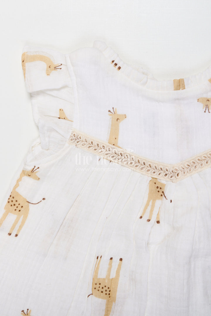 The Nesavu Girls Cotton Frock Baby Girl Muslin Cotton Frock with Giraffe Print for Casual Outings and Playdates Nesavu Nesavu baby girl muslin cotton frock with giraffe print for everyday wear and outings