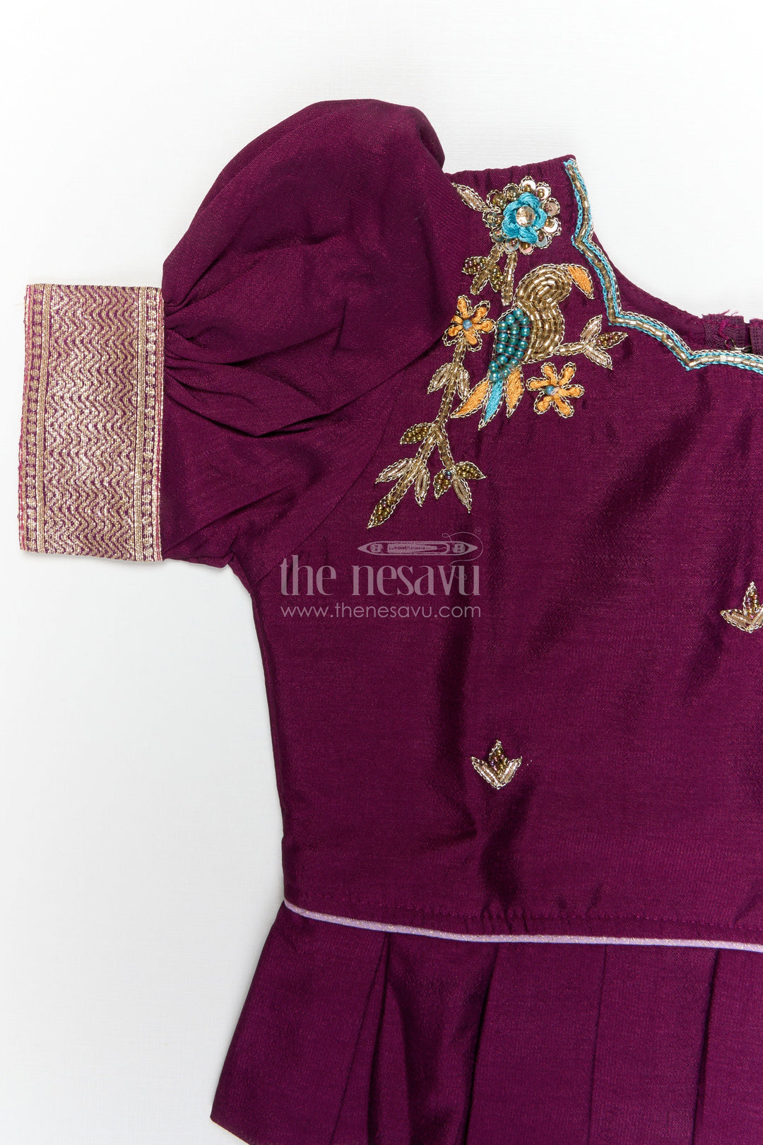 The Nesavu Pattu Pavadai Baby Girl Pattu Pavadai for Temple Visits and Traditional Festivals Nesavu Nesavu baby girl pattu pavadai with zari border and embroidered blouse for temple and festive occasions