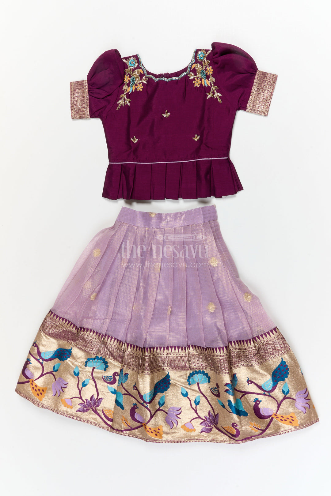 The Nesavu Pattu Pavadai Baby Girl Pattu Pavadai for Temple Visits and Traditional Festivals Nesavu Nesavu baby girl pattu pavadai with zari border and embroidered blouse for temple and festive occasions