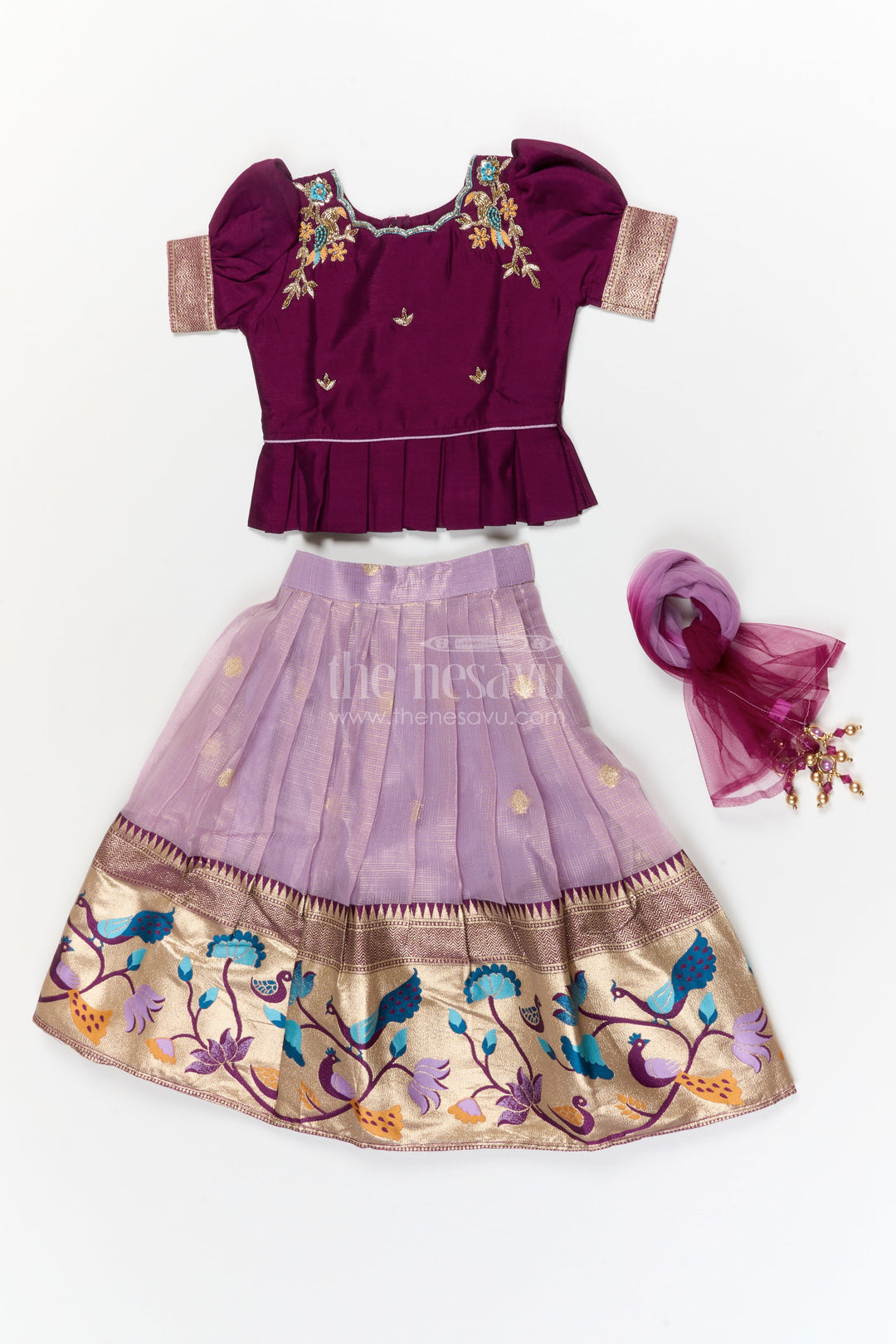 The Nesavu Pattu Pavadai Baby Girl Pattu Pavadai for Temple Visits and Traditional Festivals Nesavu Nesavu baby girl pattu pavadai with zari border and embroidered blouse for temple and festive occasions