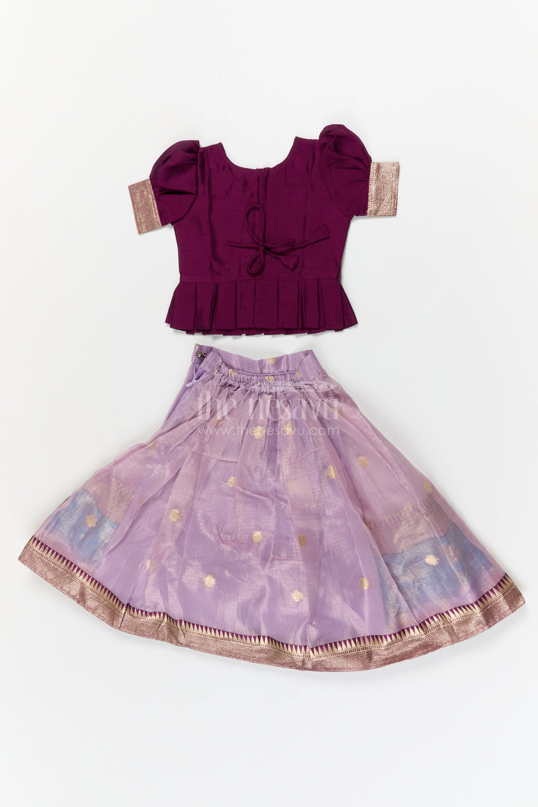 The Nesavu Pattu Pavadai Baby Girl Pattu Pavadai for Temple Visits and Traditional Festivals Nesavu Nesavu baby girl pattu pavadai with zari border and embroidered blouse for temple and festive occasions