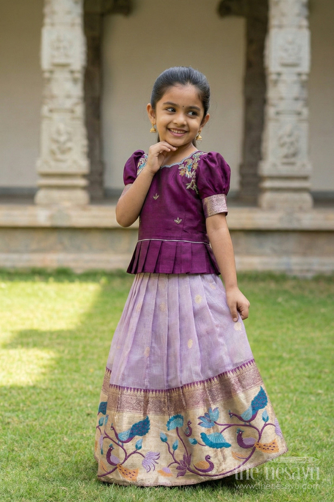 The Nesavu Pattu Pavadai Baby Girl Pattu Pavadai for Temple Visits and Traditional Festivals Nesavu Nesavu baby girl pattu pavadai with zari border and embroidered blouse for temple and festive occasions