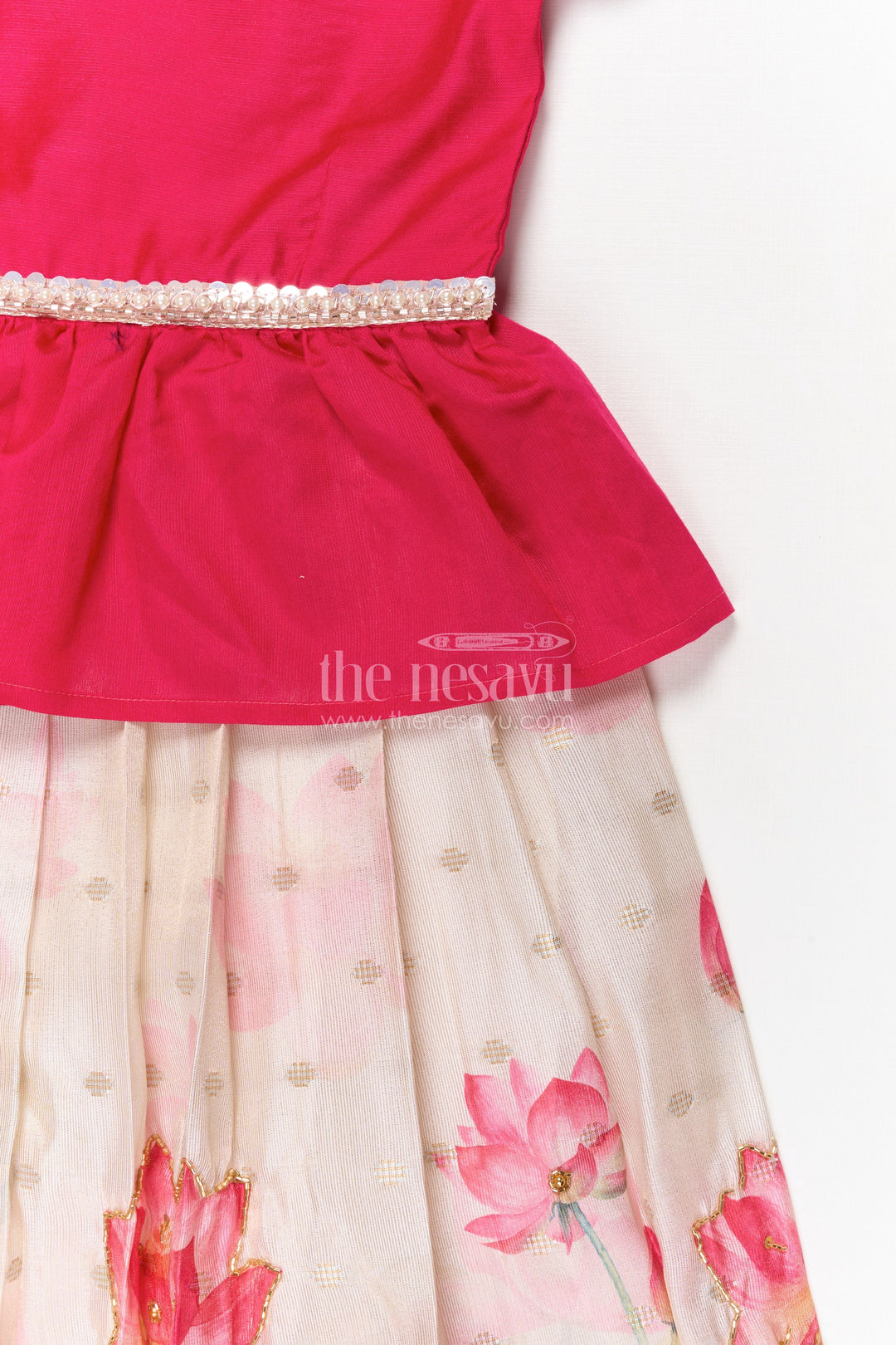The Nesavu Pattu Pavadai Baby Girl Pattu Pavadai with Floral Print Skirt for Festive Moments Nesavu Nesavu baby girl pattu pavadai with floral tissue print skirt and semi raw silk blouse for festive occasions