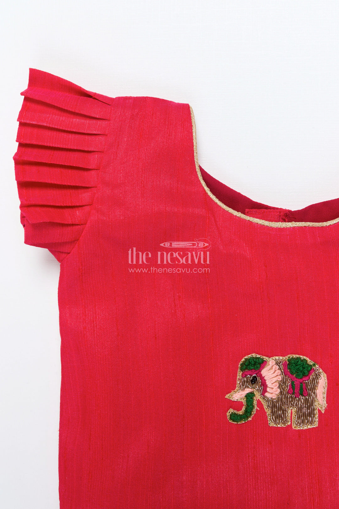 The Nesavu Pattu Pavadai Baby Girl Pattu Pavadai with Floral Skirt and Elephant-embroidered Blouse Nesavu Nesavu baby girl pattu pavadai with lotus print skirt and embroidered elephant blouse