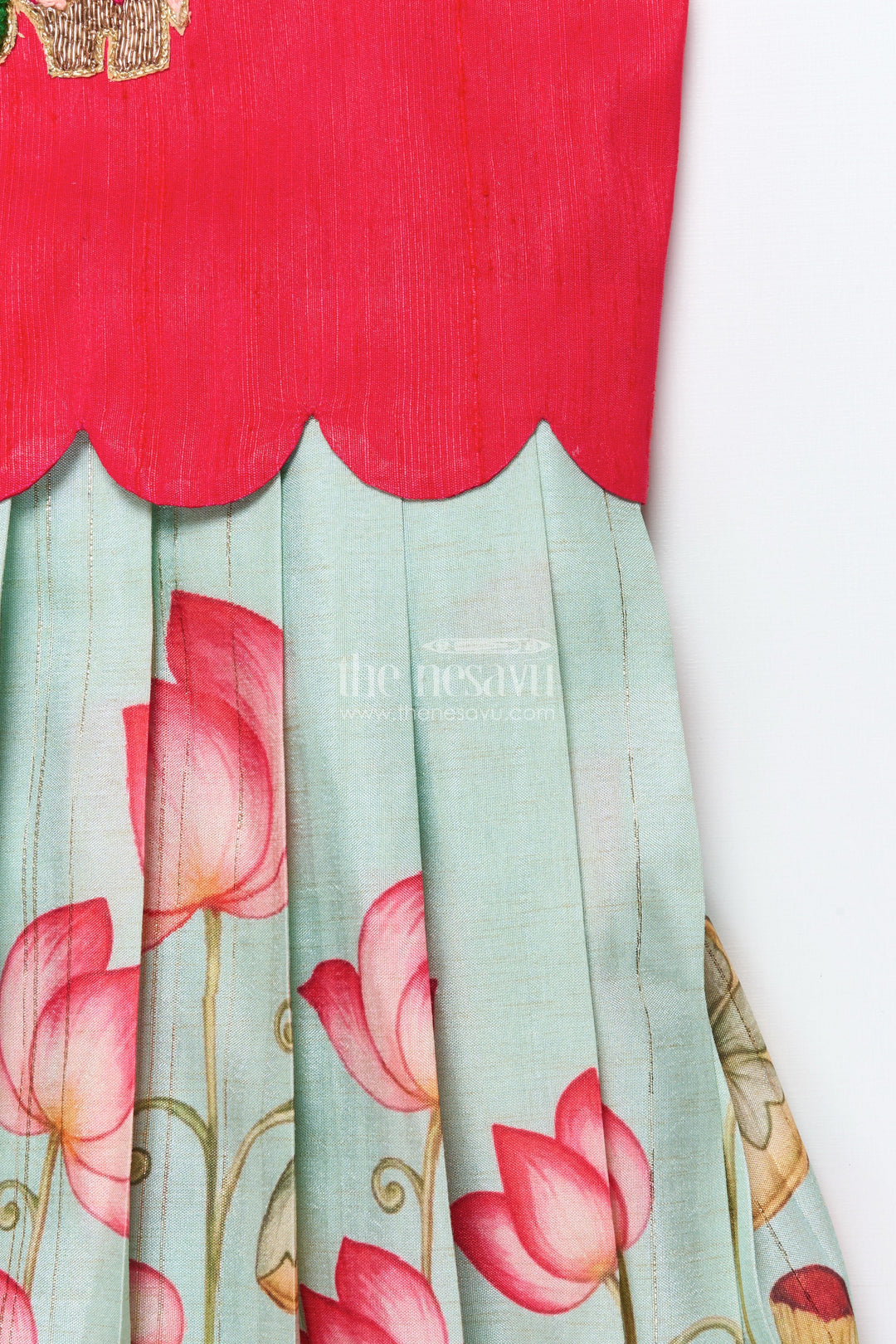 The Nesavu Pattu Pavadai Baby Girl Pattu Pavadai with Floral Skirt and Elephant-embroidered Blouse Nesavu Nesavu baby girl pattu pavadai with lotus print skirt and embroidered elephant blouse