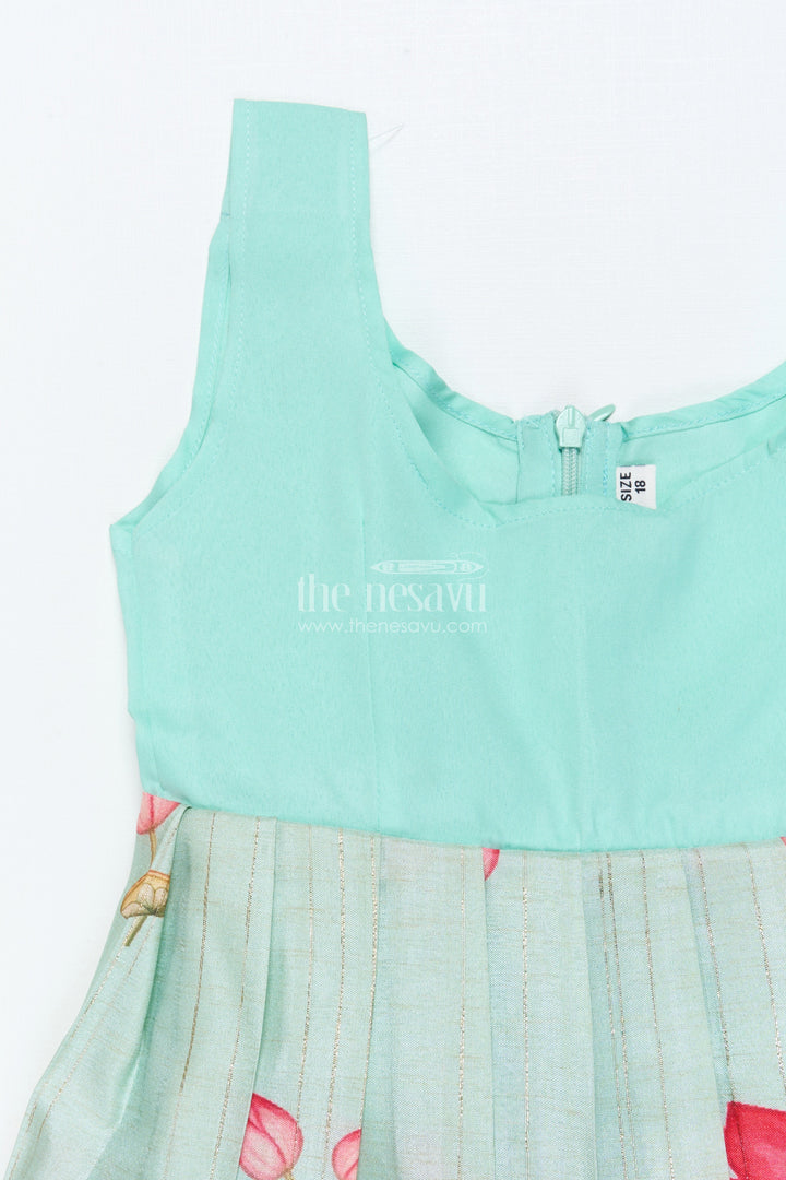 The Nesavu Pattu Pavadai Baby Girl Pattu Pavadai with Floral Skirt and Elephant-embroidered Blouse Nesavu Nesavu baby girl pattu pavadai with lotus print skirt and embroidered elephant blouse