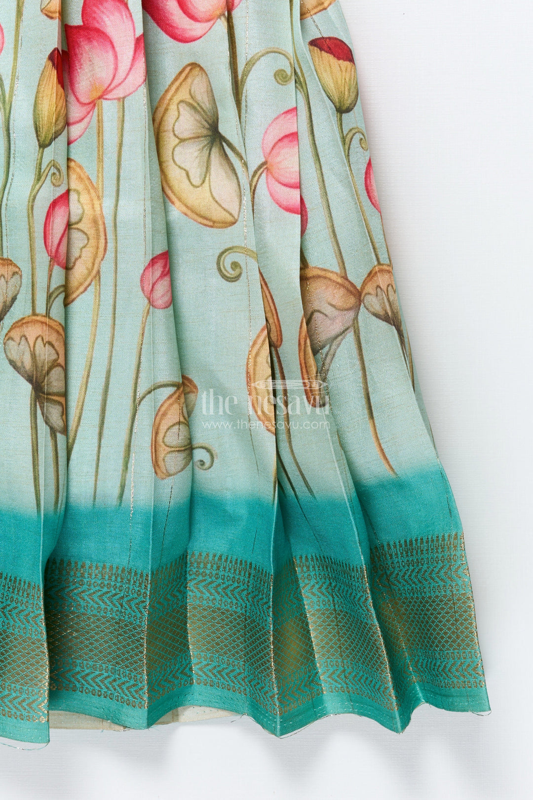 The Nesavu Pattu Pavadai Baby Girl Pattu Pavadai with Floral Skirt and Elephant-embroidered Blouse Nesavu Nesavu baby girl pattu pavadai with lotus print skirt and embroidered elephant blouse