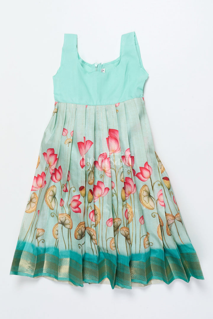 The Nesavu Pattu Pavadai Baby Girl Pattu Pavadai with Floral Skirt and Elephant-embroidered Blouse Nesavu Nesavu baby girl pattu pavadai with lotus print skirt and embroidered elephant blouse