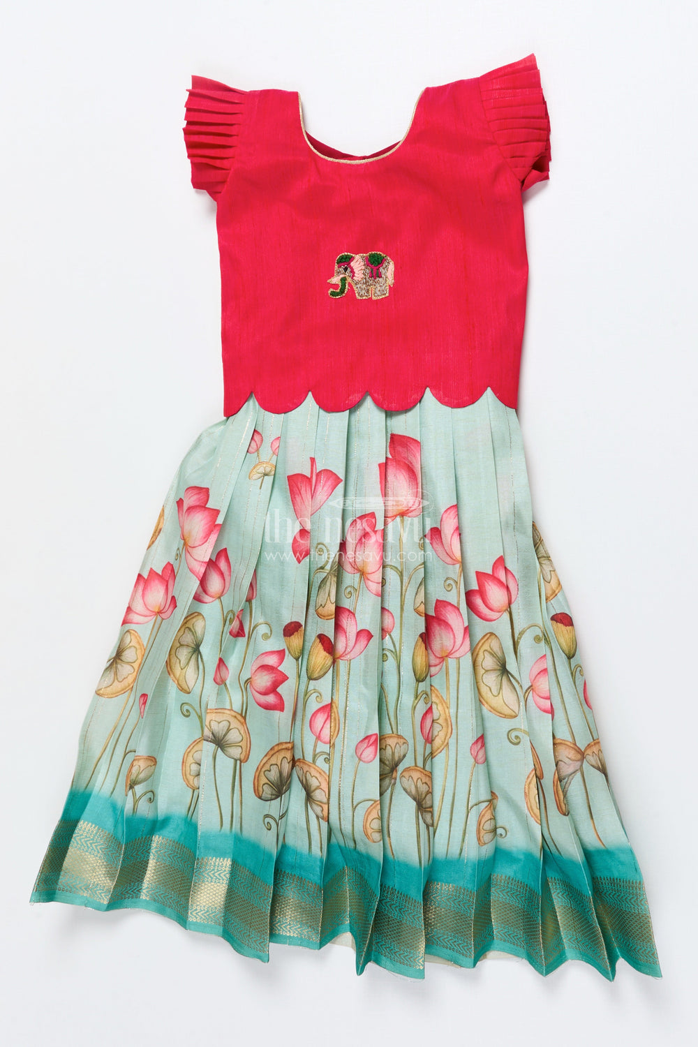 The Nesavu Pattu Pavadai Baby Girl Pattu Pavadai with Floral Skirt and Elephant-embroidered Blouse Nesavu Nesavu baby girl pattu pavadai with lotus print skirt and embroidered elephant blouse