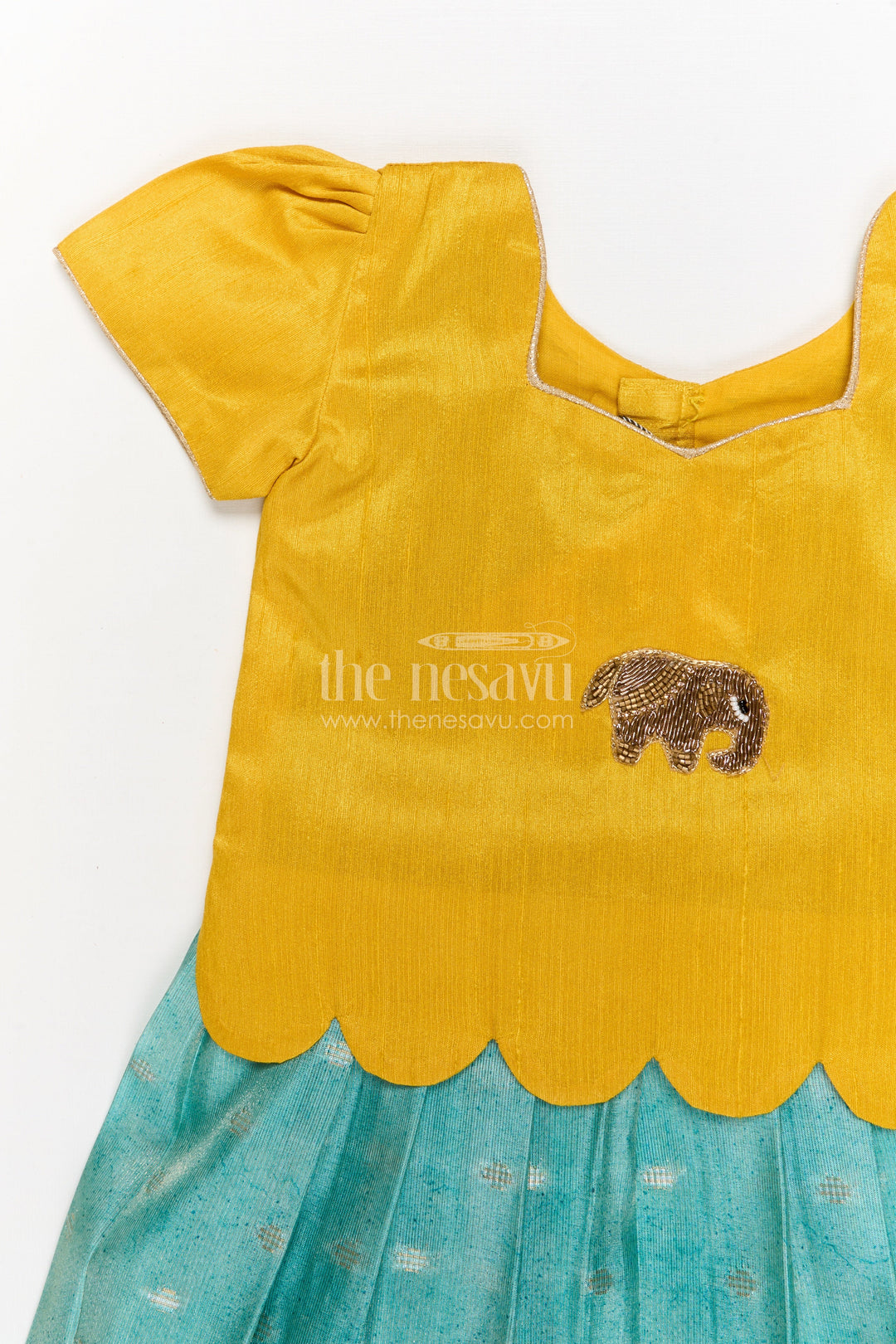 The Nesavu Pattu Pavadai Baby Girl Pattu Pavadai with Raw Silk Yoke for Cultural Celebrations Nesavu 18 (2Y) / Yellow GPP354B-18 Nesavu baby girl pattu pavadai with raw silk yoke and semi Banaras art silk skirt for naming ceremonies