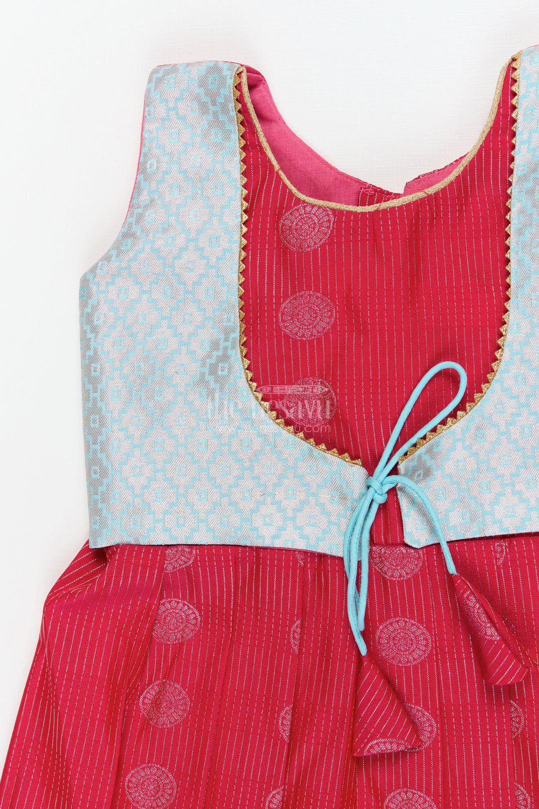 The Nesavu Girls Kanchi Silk Frock Baby Girl Silk Frock for Cultural Events and Festive Photo Moments Nesavu Nesavu baby girl silk frock with zari border and tie-up overlay for festive family occasions