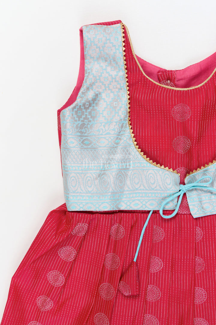 The Nesavu Girls Kanchi Silk Frock Baby Girl Silk Frock for Cultural Events and Festive Photo Moments Nesavu Nesavu baby girl silk frock with zari border and tie-up overlay for festive family occasions