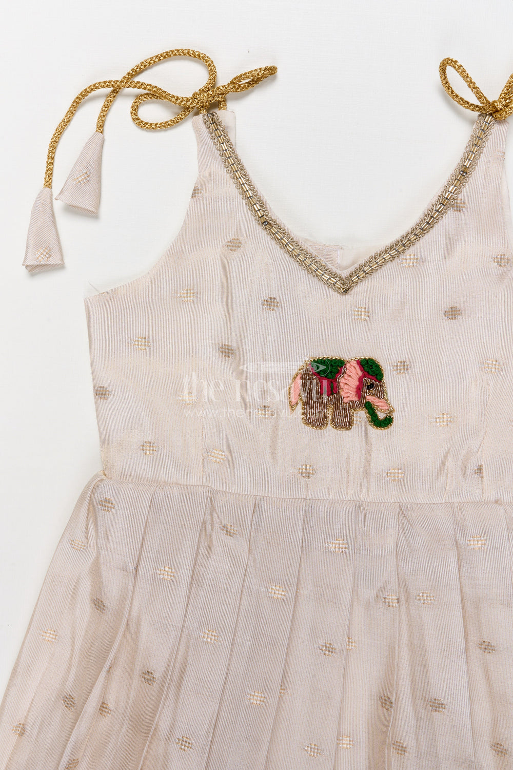 The Nesavu Tie-up Frock Baby Girl Tie-up Frock for Ethnic Functions and Naming Ceremonies Nesavu Nesavu baby girl ethnic frock with elephant embroidery and Banaras art silk for festive rituals