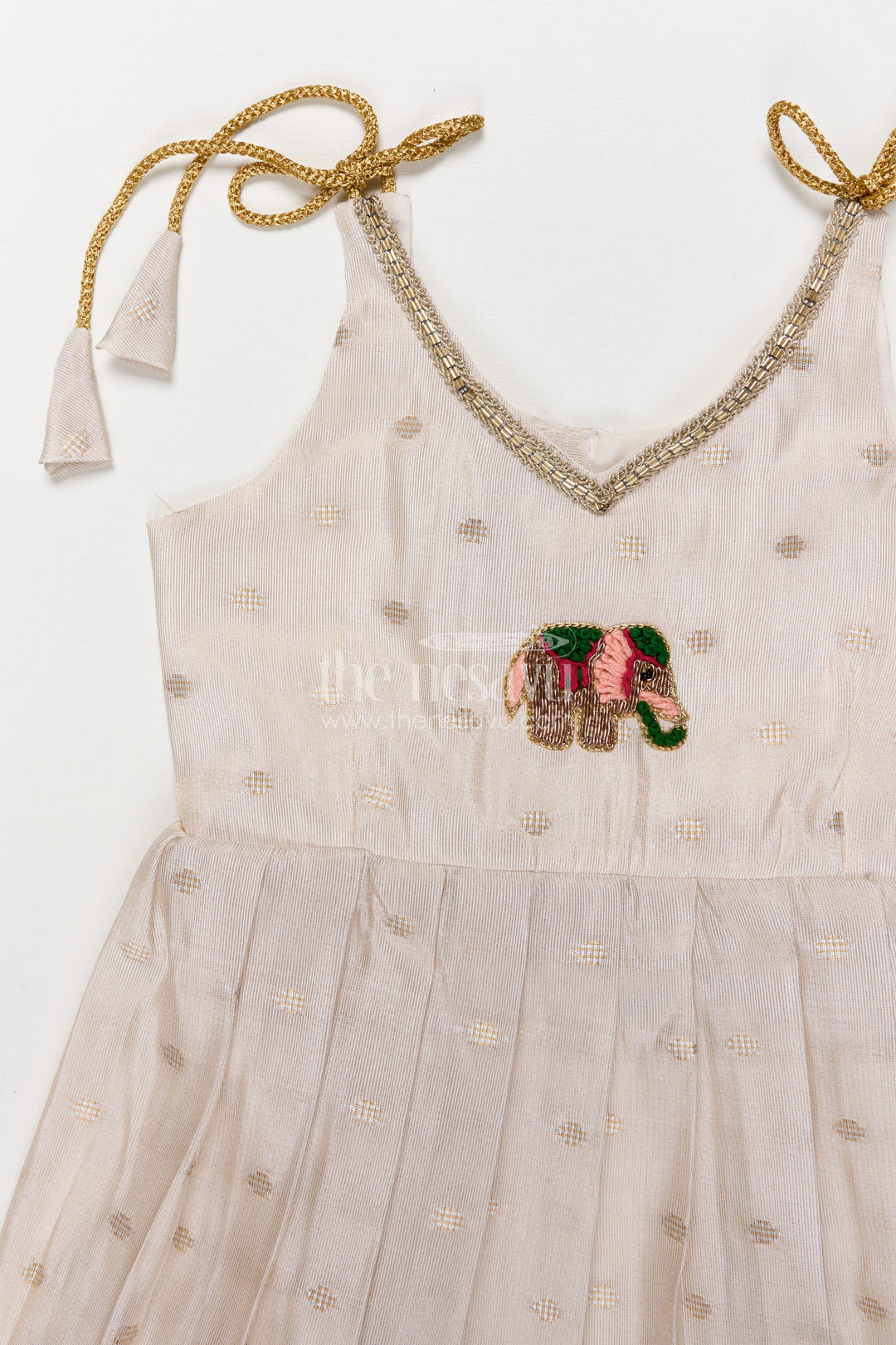 The Nesavu Tie-up Frock Baby Girl Tie-up Frock for Ethnic Functions and Naming Ceremonies Nesavu Nesavu baby girl ethnic frock with elephant embroidery and Banaras art silk for festive rituals