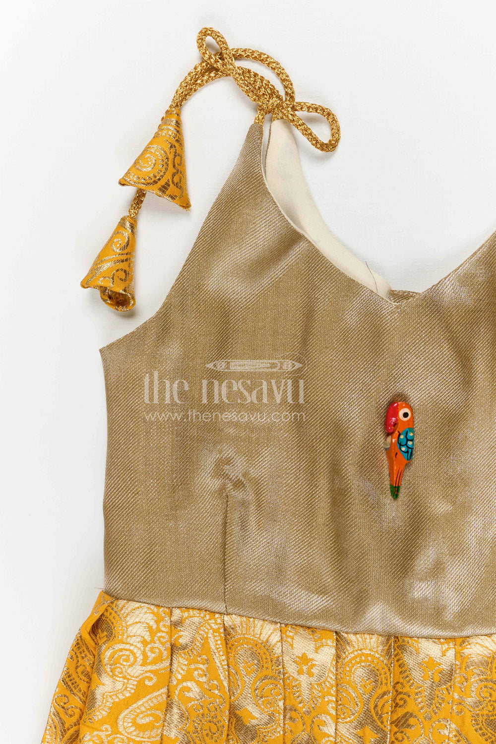 The Nesavu Tie-up Frock Baby Girl Tie up Frock for Festive Wear and Traditional Occasions Nesavu Nesavu baby girl tie up frock for festive wear with semi banaras fabric and tissue yoke flared design