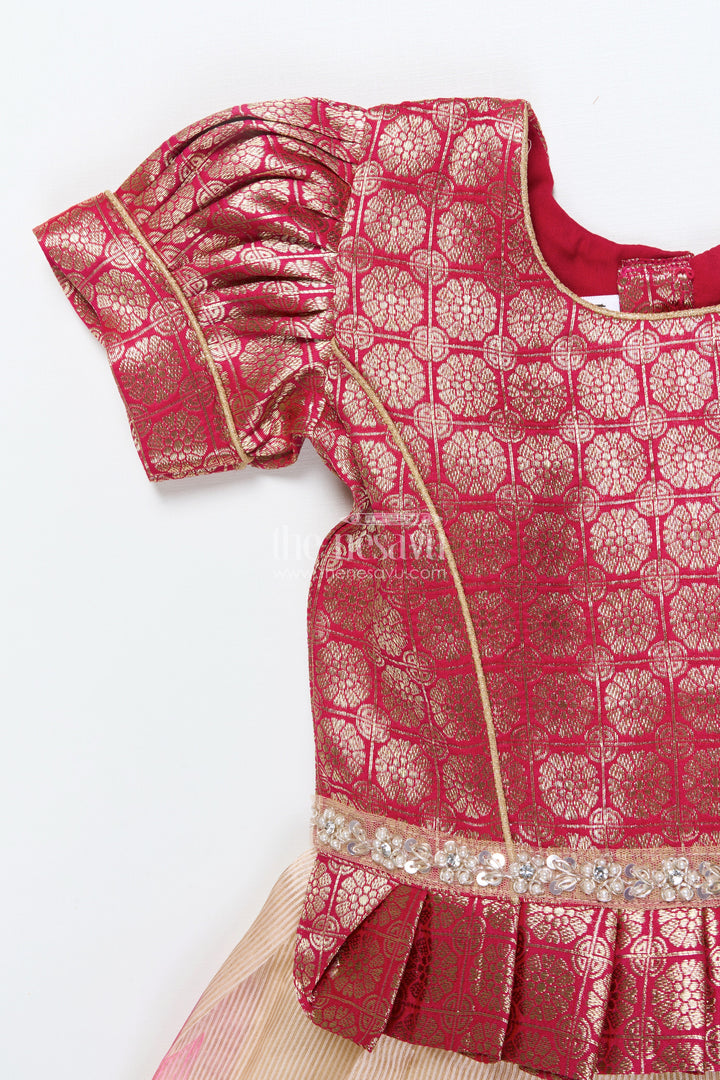 The Nesavu Pattu Pavadai Baby Girl Tissue Silk Pattu Pavadai with Semi Banaras Yoke for Weddings Nesavu Nesavu baby girl red tissue silk pattu pavadai with zari skirt for weddings and festive celebrations