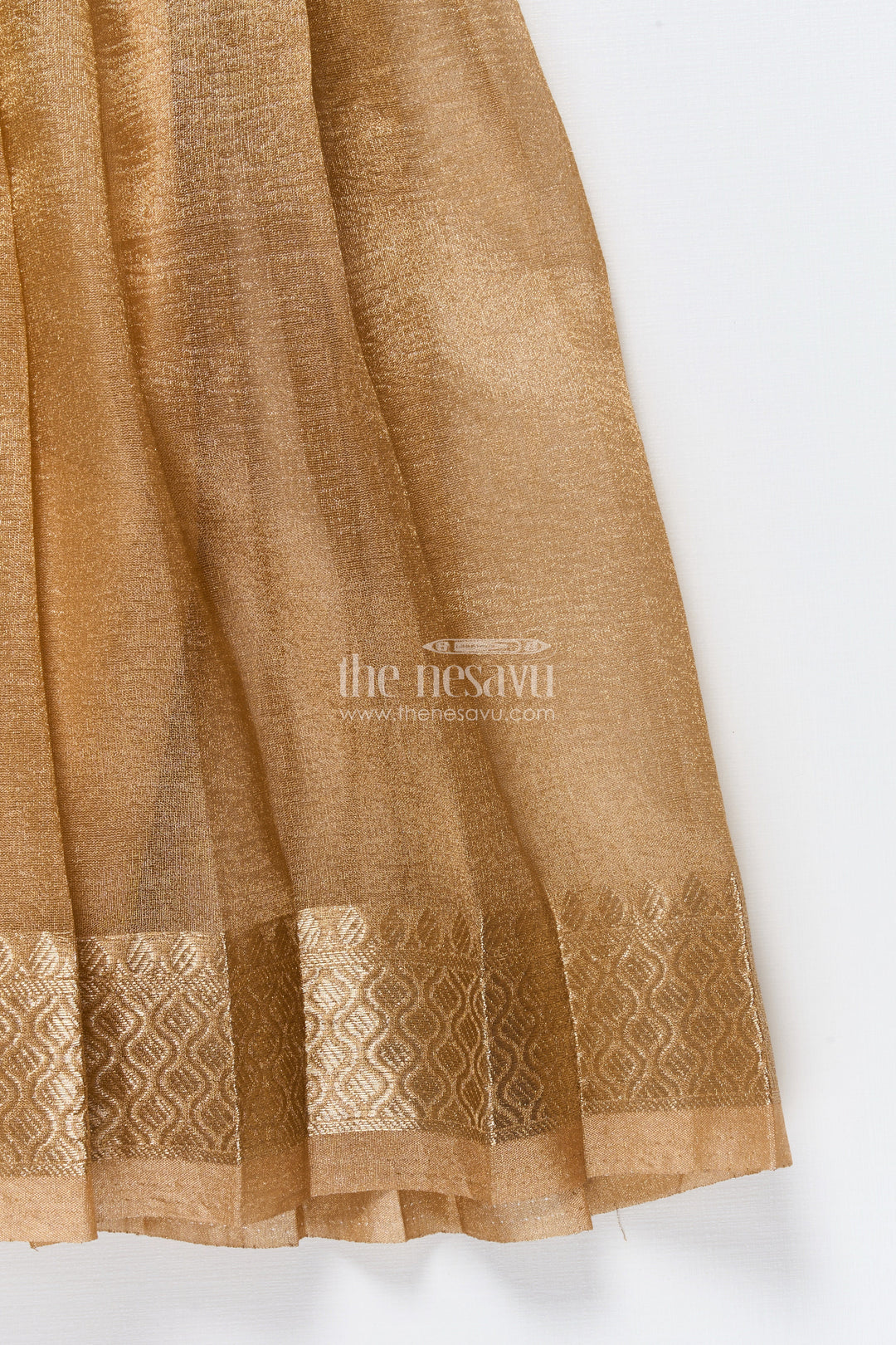 The Nesavu Pattu Pavadai Baby Girl Traditional Pattu Pavadai in Tissue Silk with Zari Finish Nesavu Nesavu baby girl golden tissue silk pattu pavadai with semi Banaras blouse for festive wear