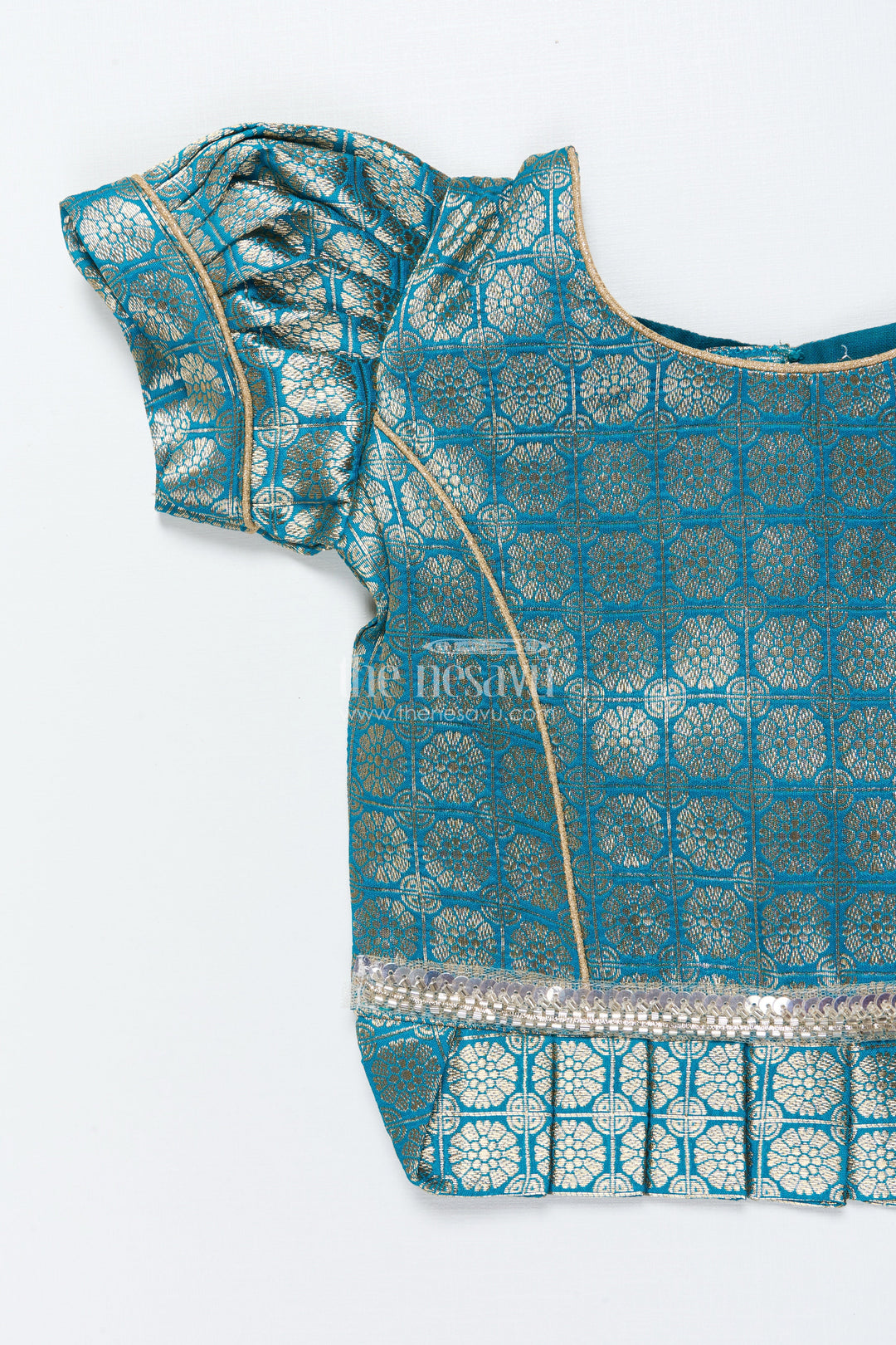 The Nesavu Pattu Pavadai Baby Girl Traditional Pattu Pavadai in Tissue Silk with Zari Finish Nesavu Nesavu baby girl golden tissue silk pattu pavadai with semi Banaras blouse for festive wear